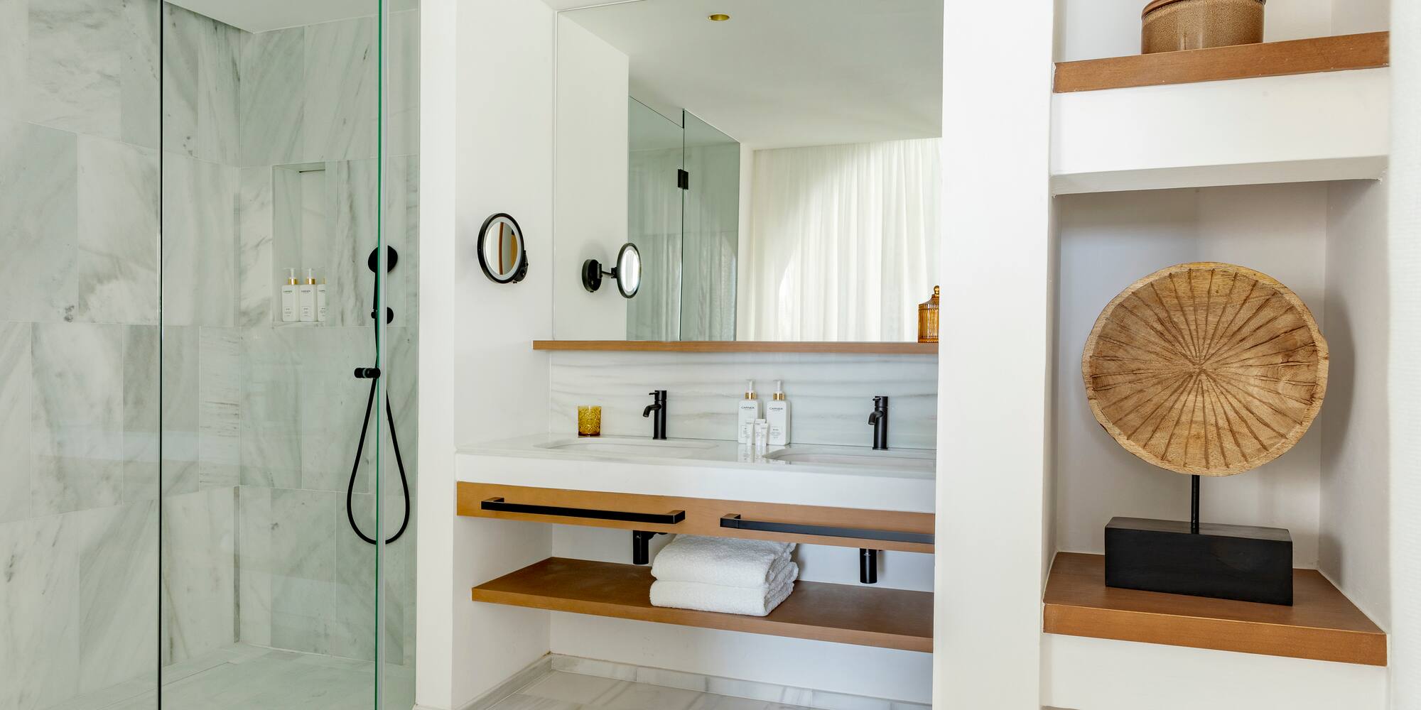 a bathroom with a shower and a sink