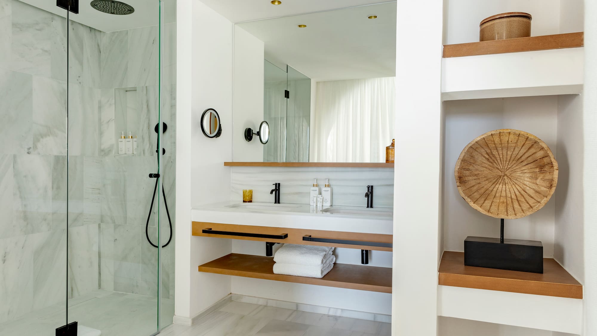 a bathroom with a shower and a sink