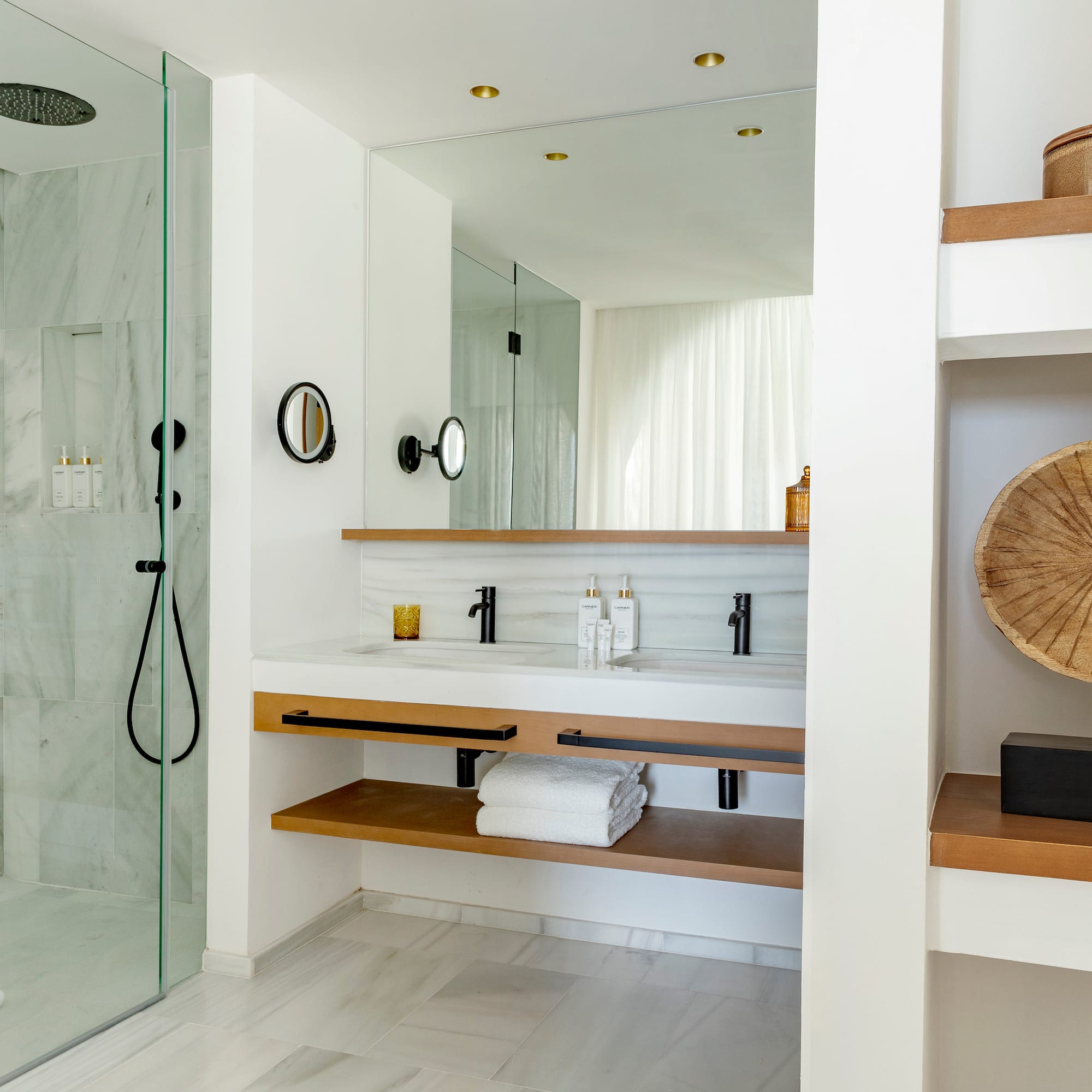 a bathroom with a shower and a sink