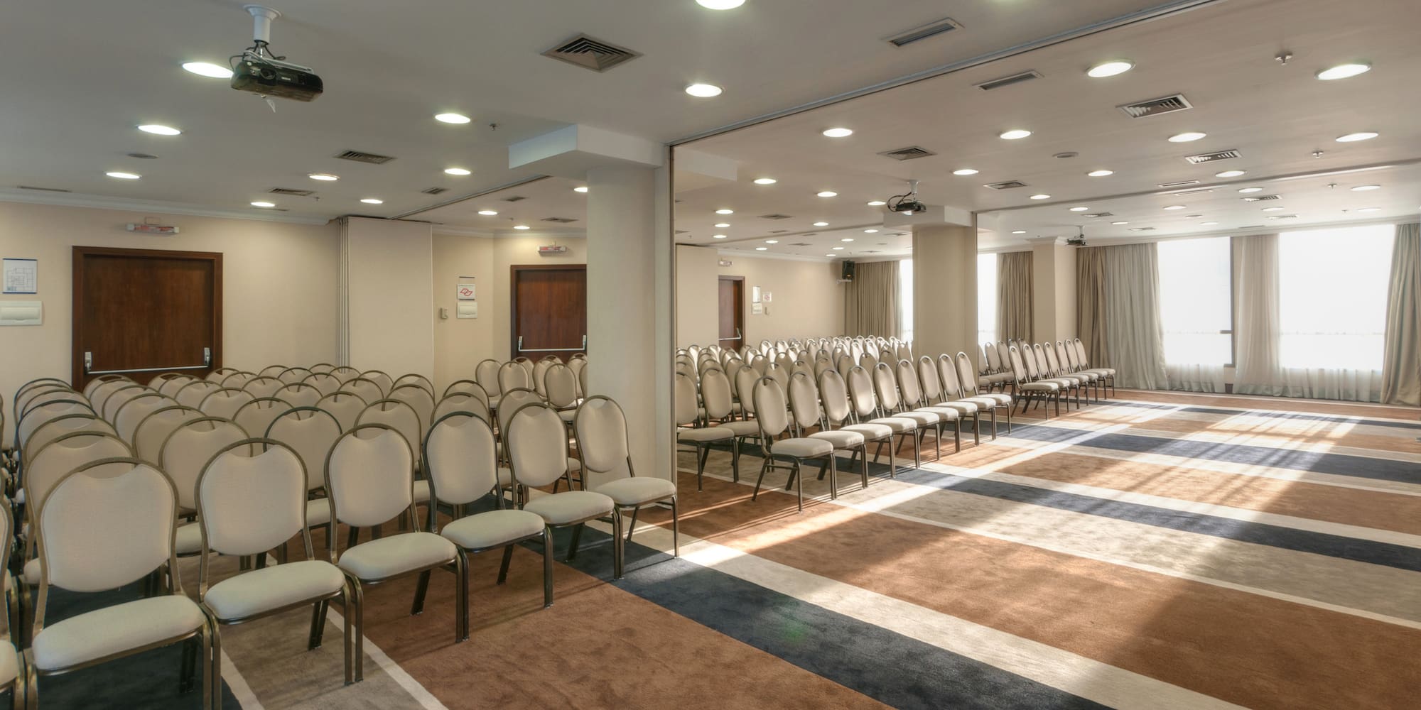 a room with rows of chairs