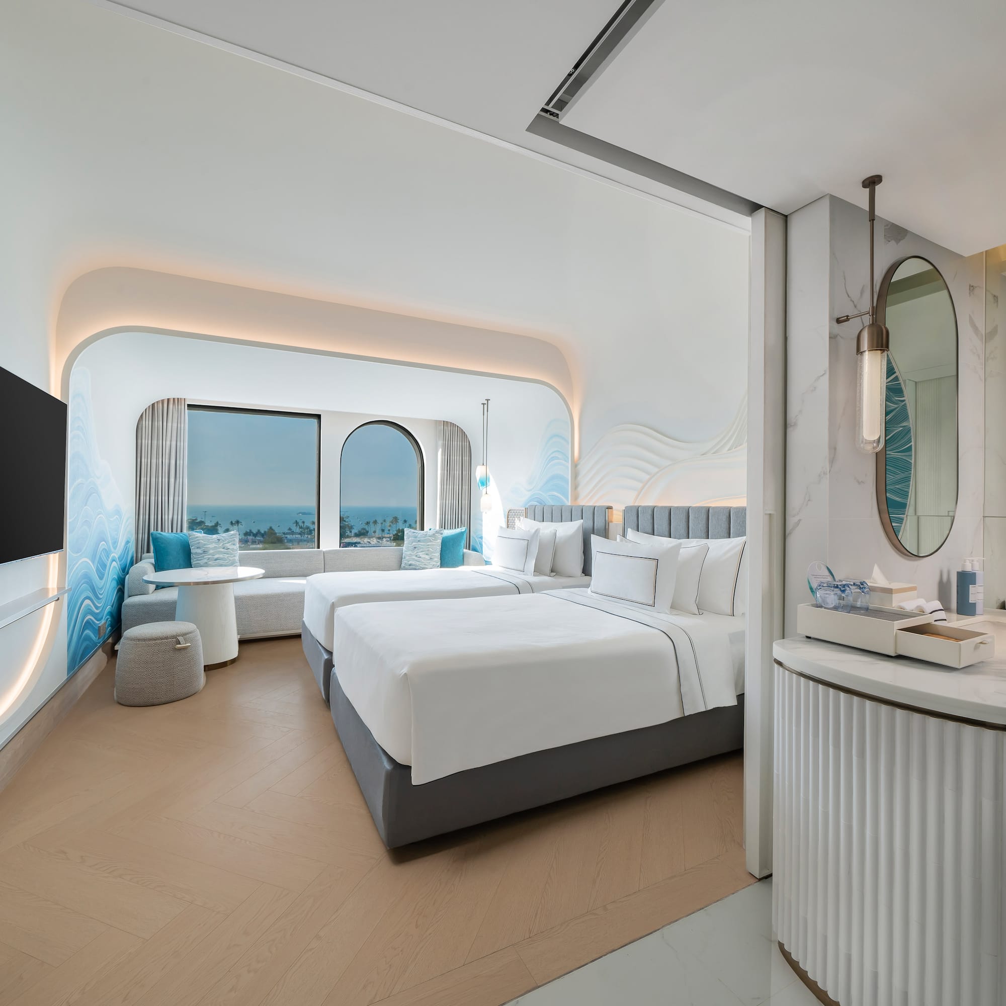 a room with a bed and a mirror