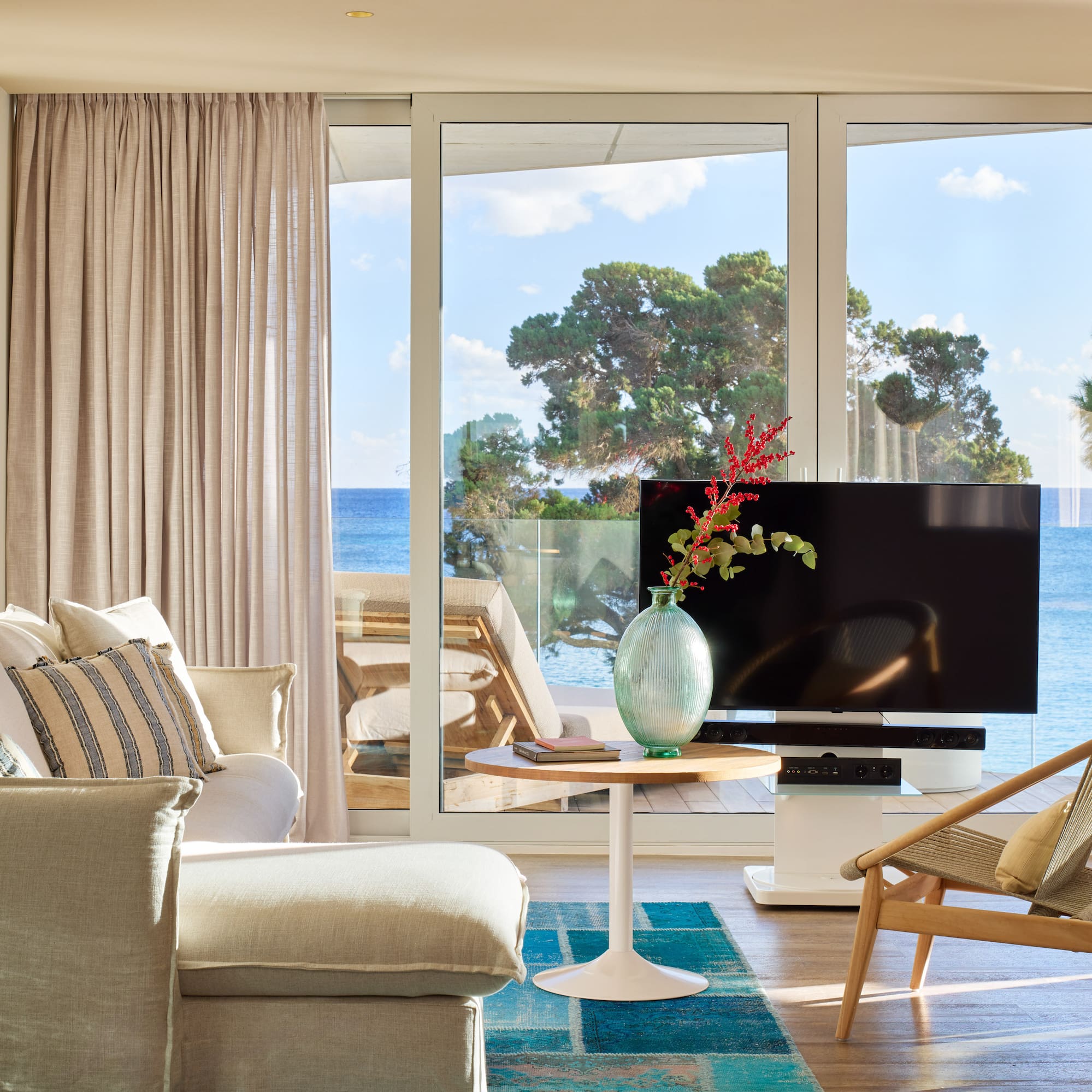 a living room with a television and a couch