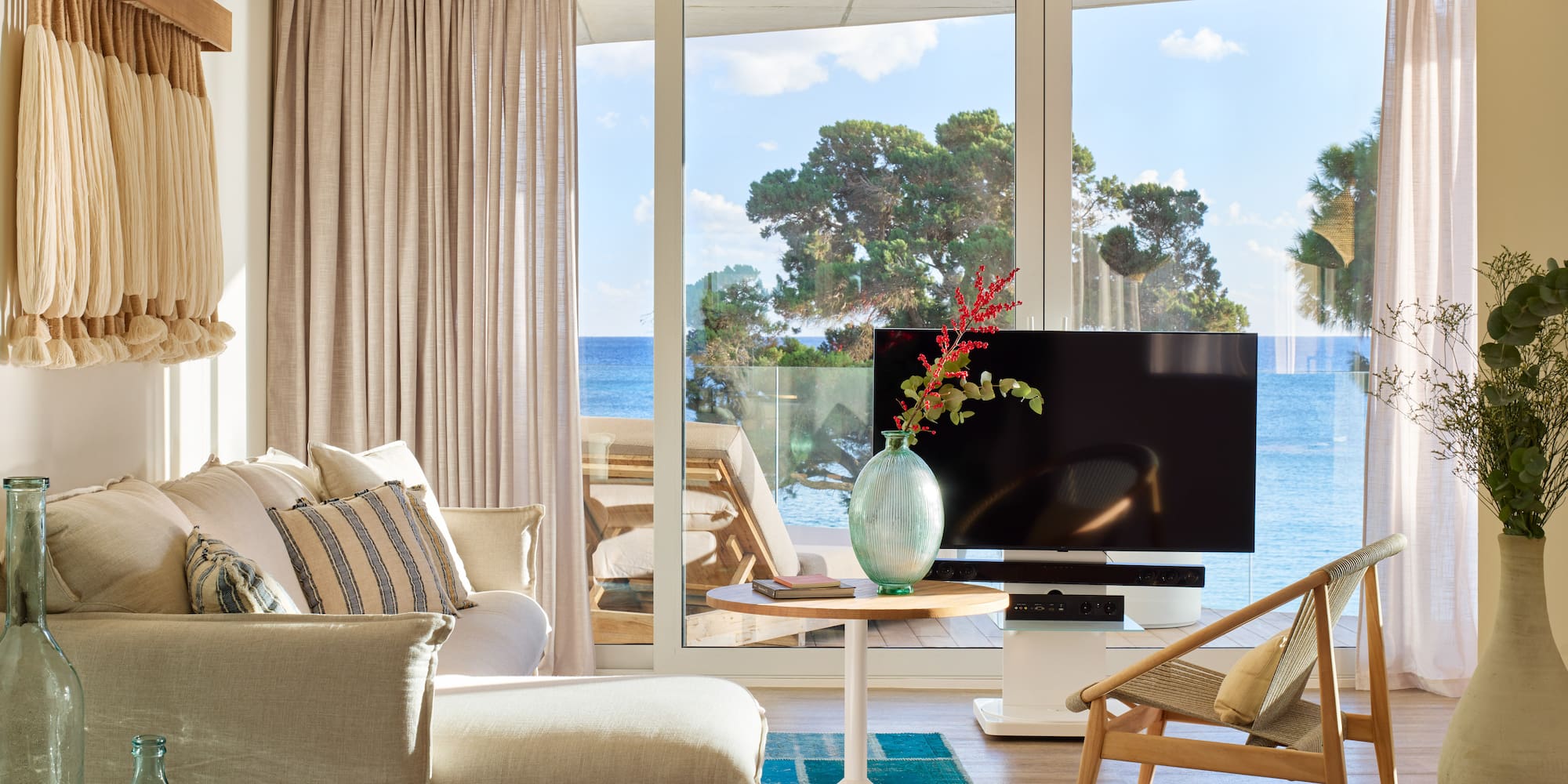 a living room with a television and a couch