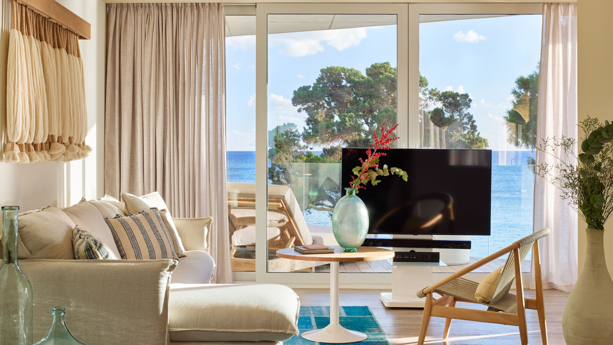 a living room with a television and a couch