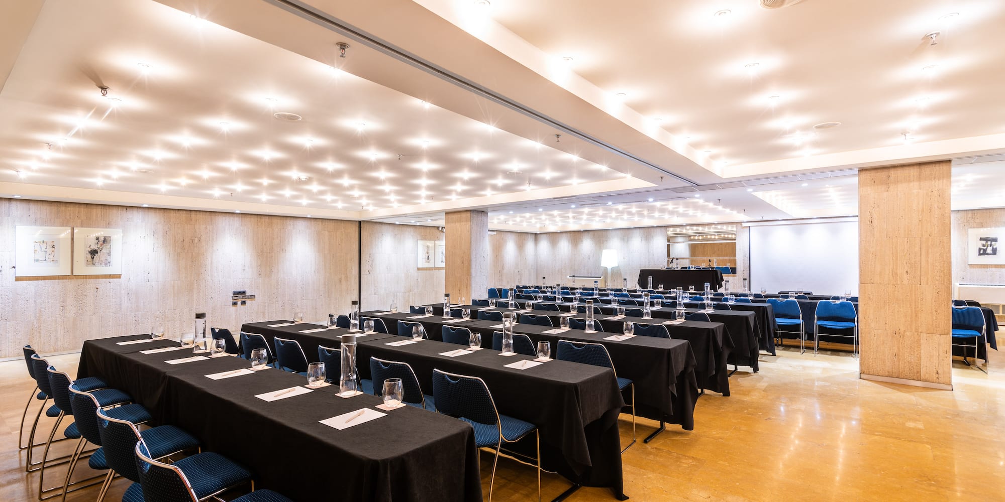 a room with tables and chairs