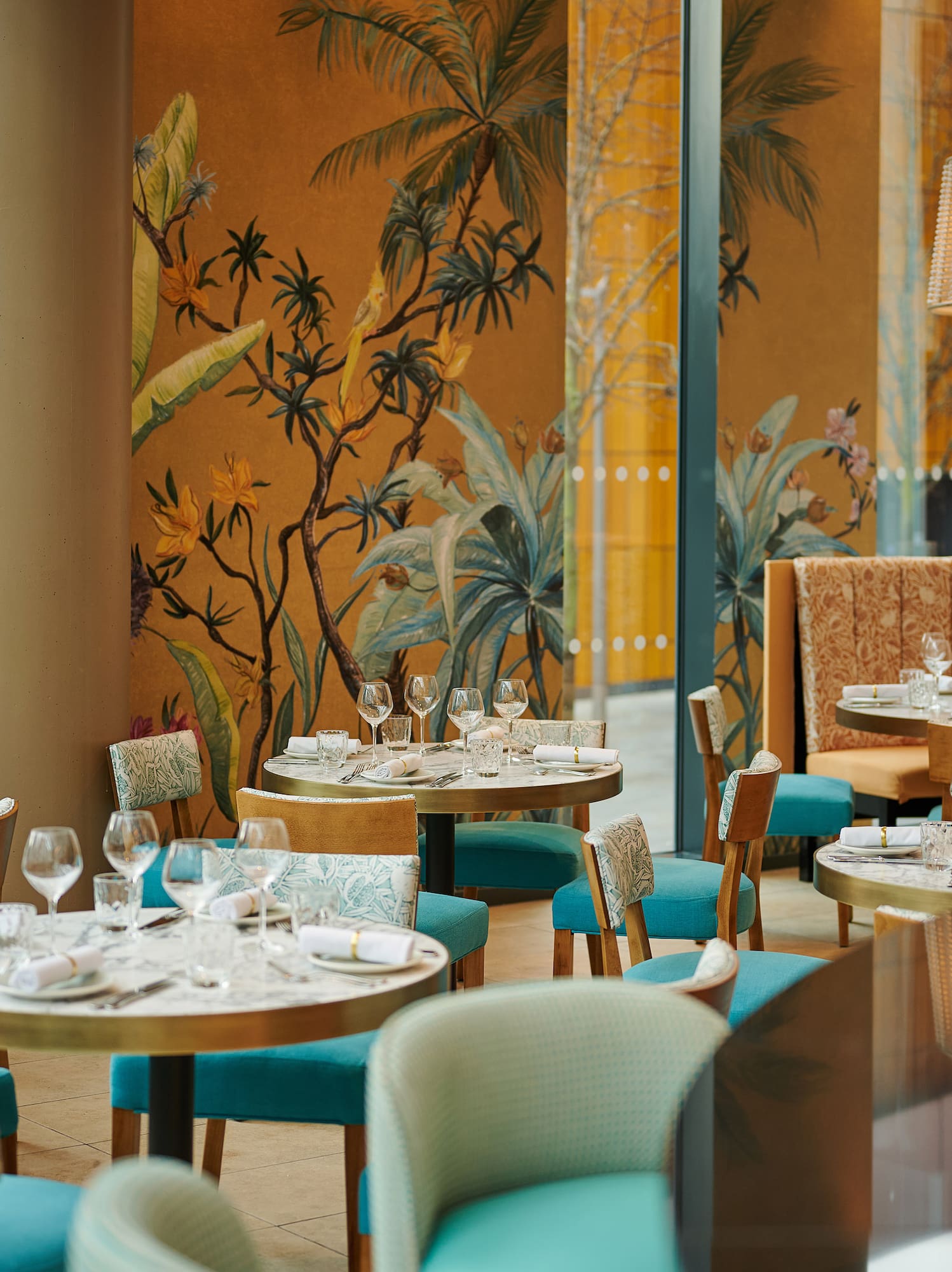 a restaurant with tables and chairs