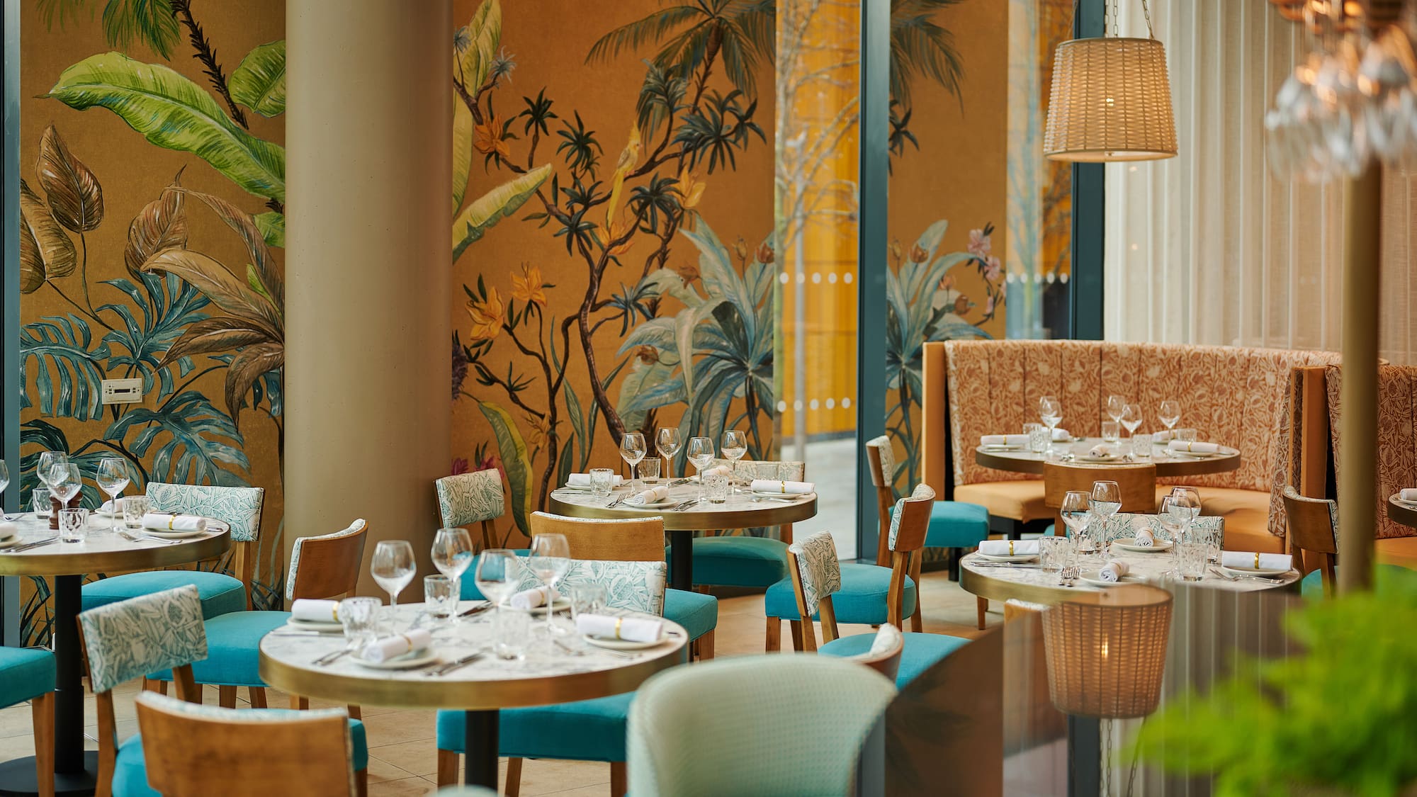 a restaurant with tables and chairs