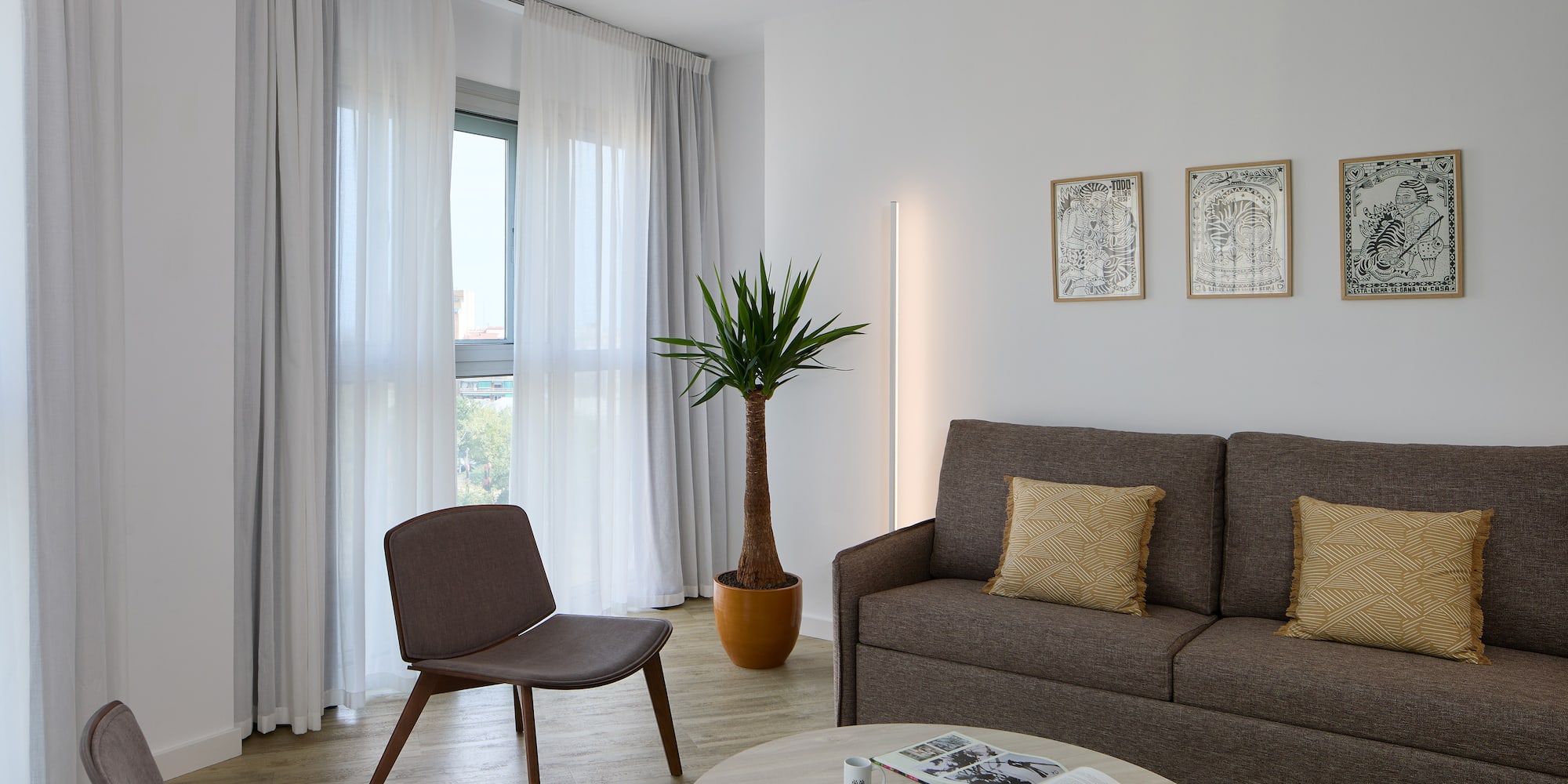 a living room with a couch and a table