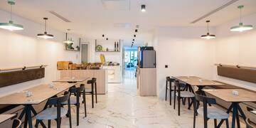 a room with tables and chairs