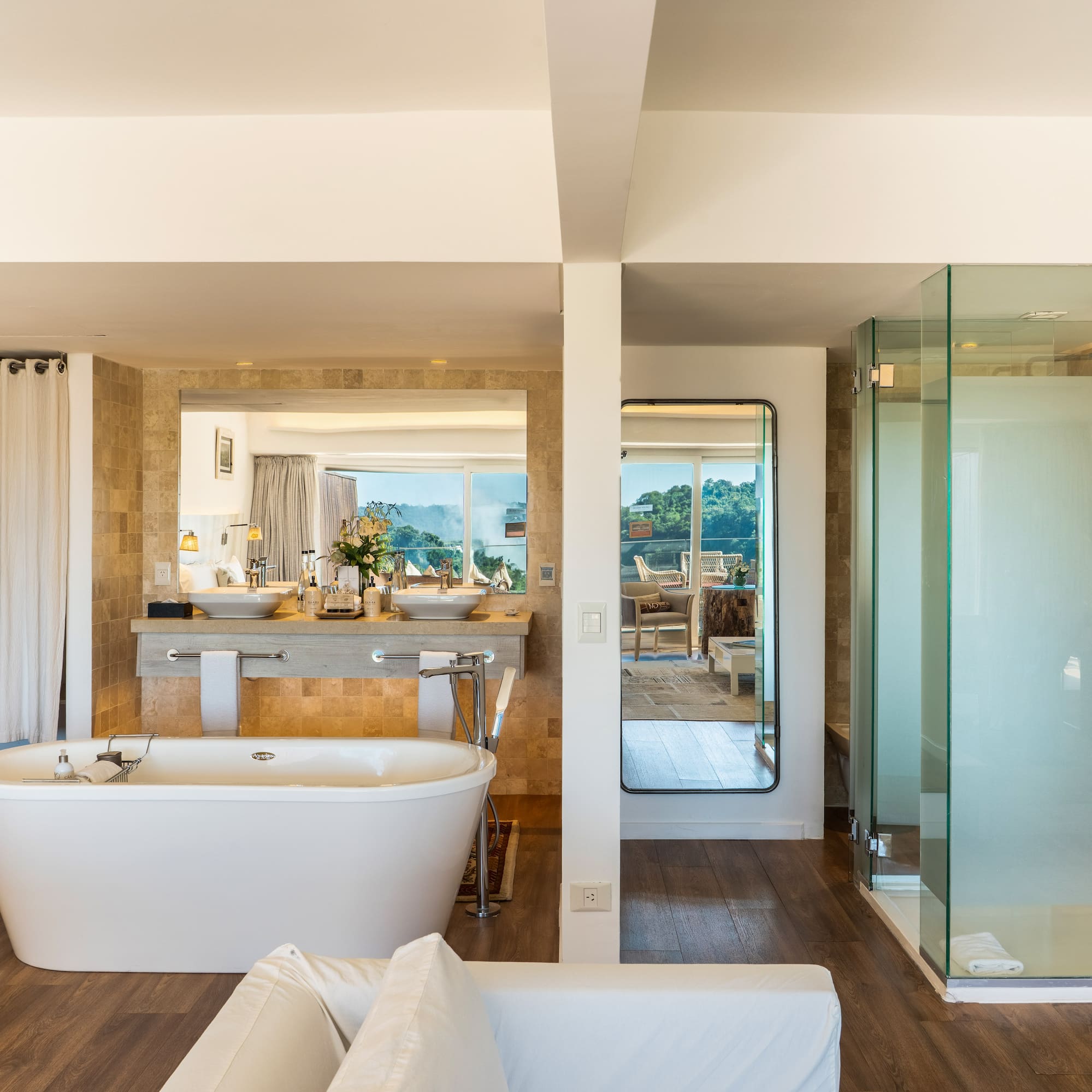 a bathroom with a tub and a shower