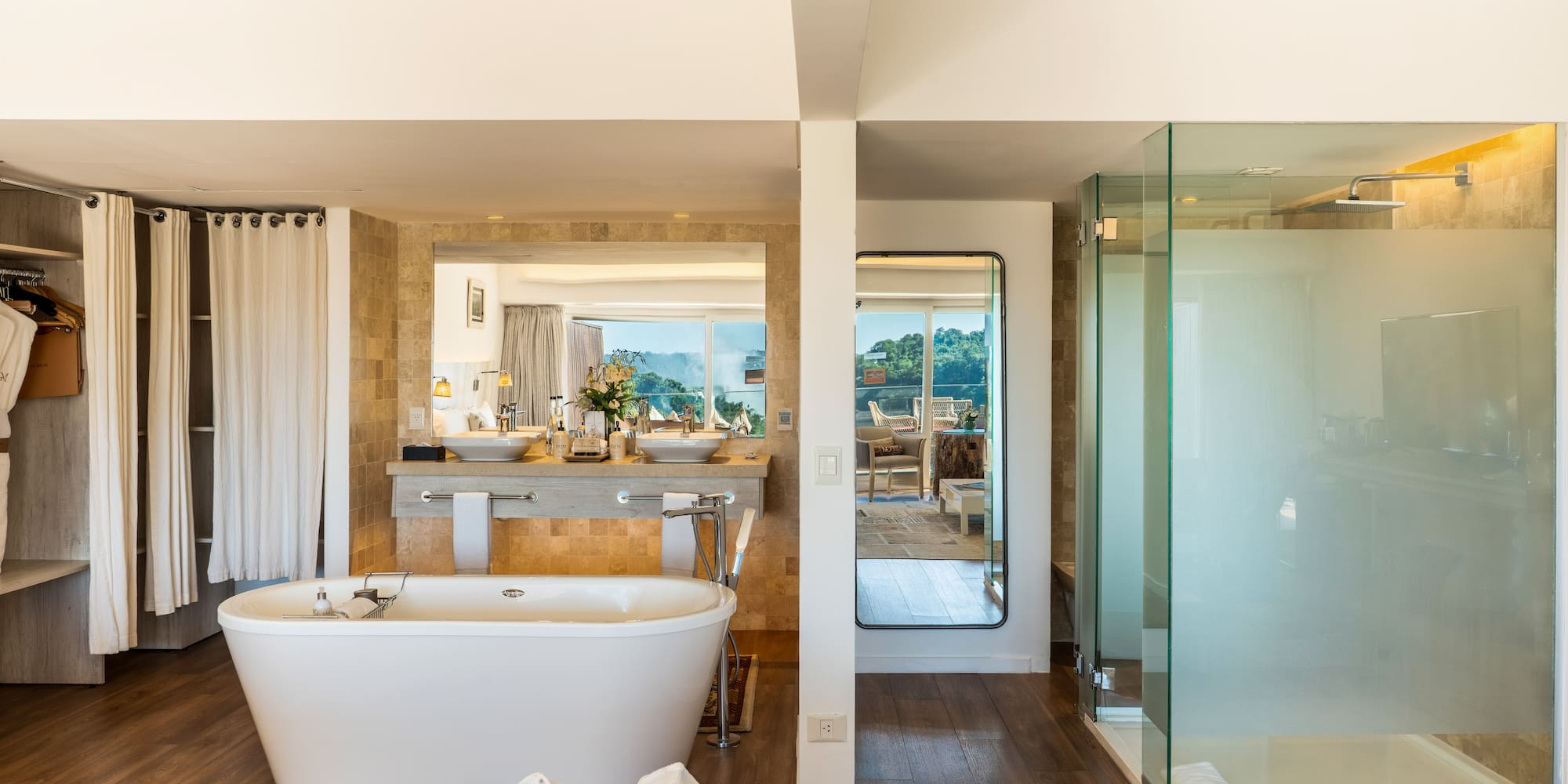 a bathroom with a tub and a shower