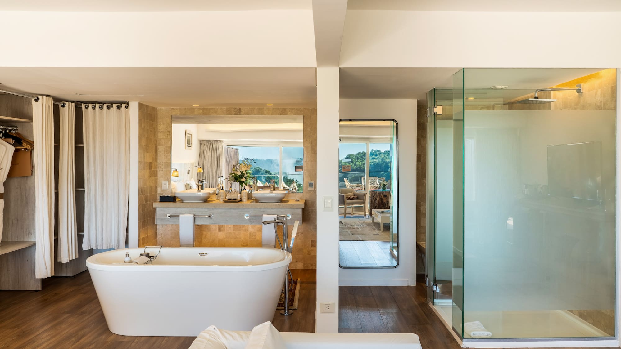 a bathroom with a tub and a shower