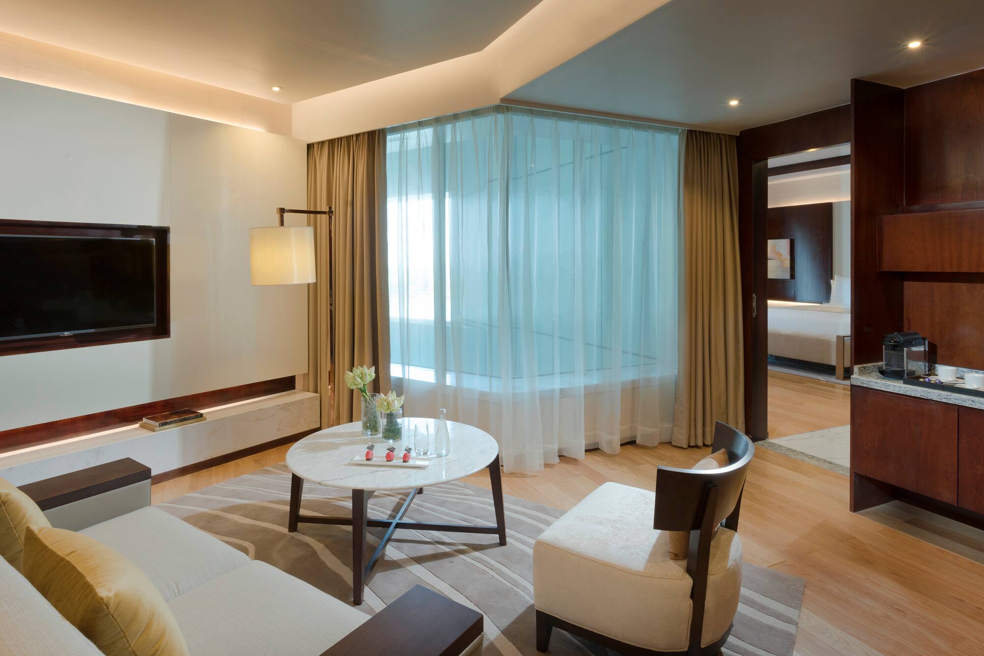 a room with a table and chairs