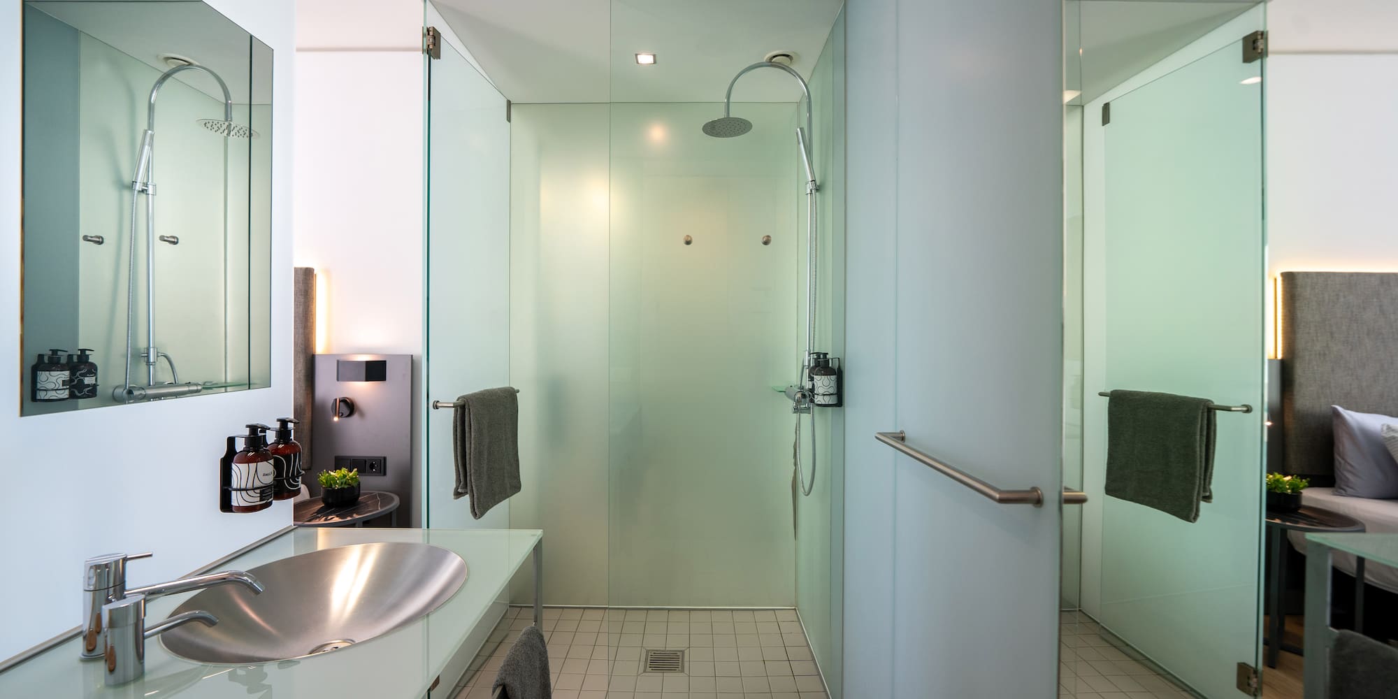 a bathroom with a sink and shower