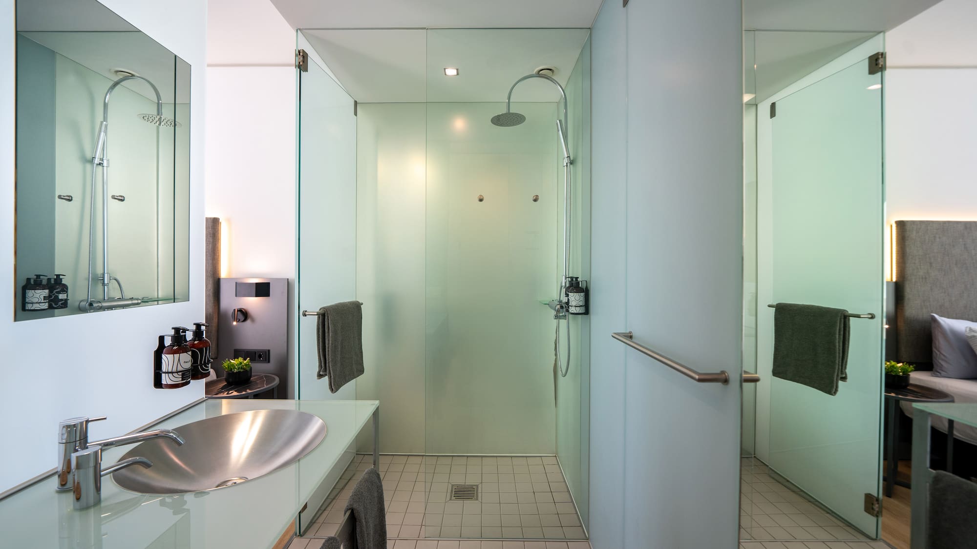 a bathroom with a sink and shower