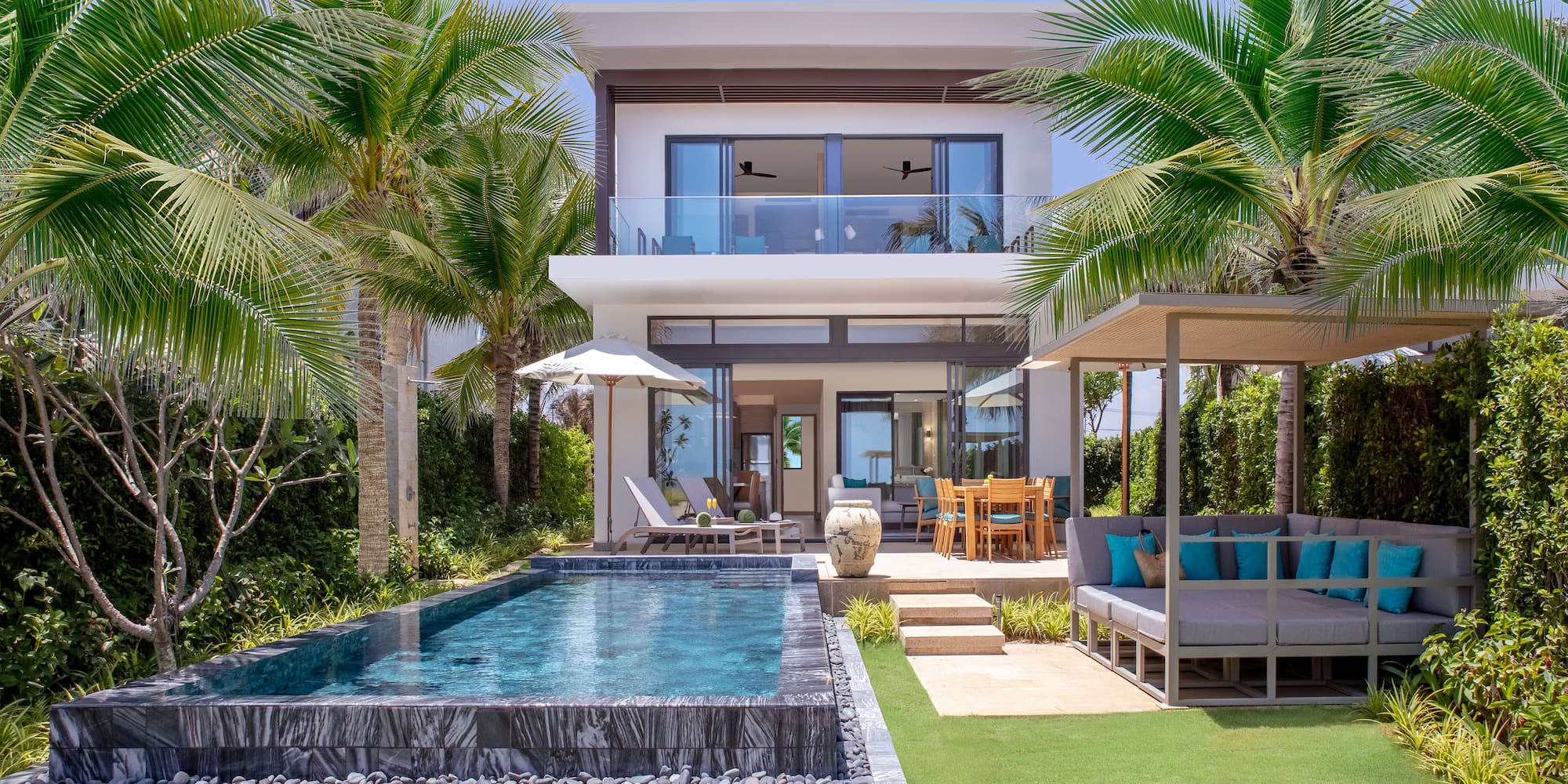 a pool in front of a house