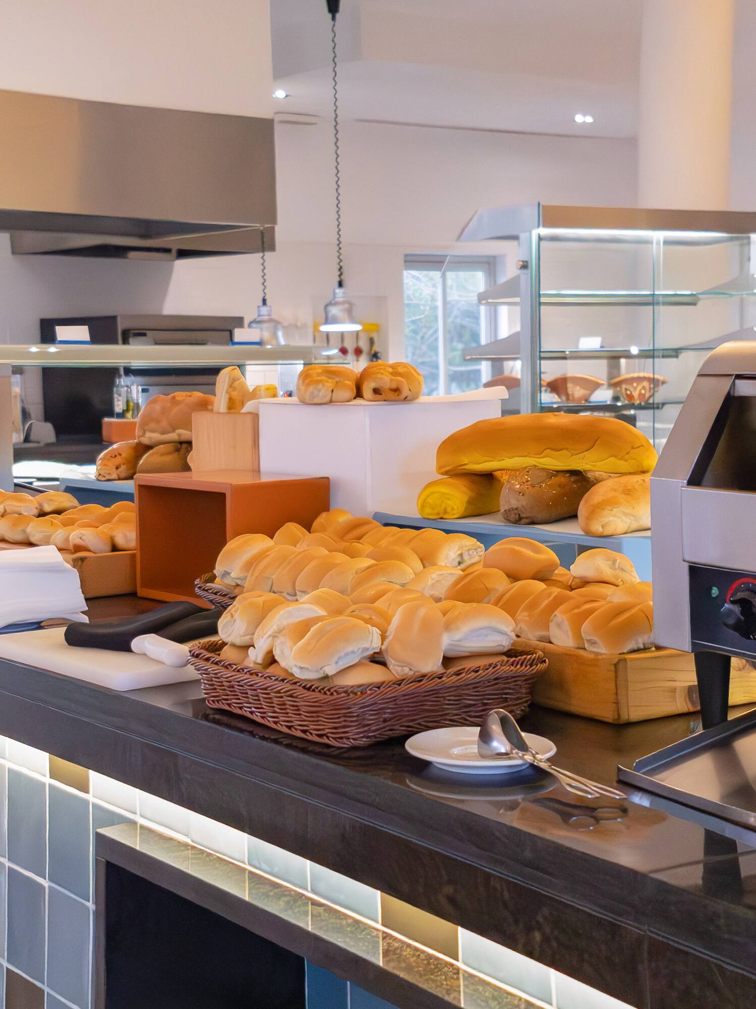 a counter with bread and other food items