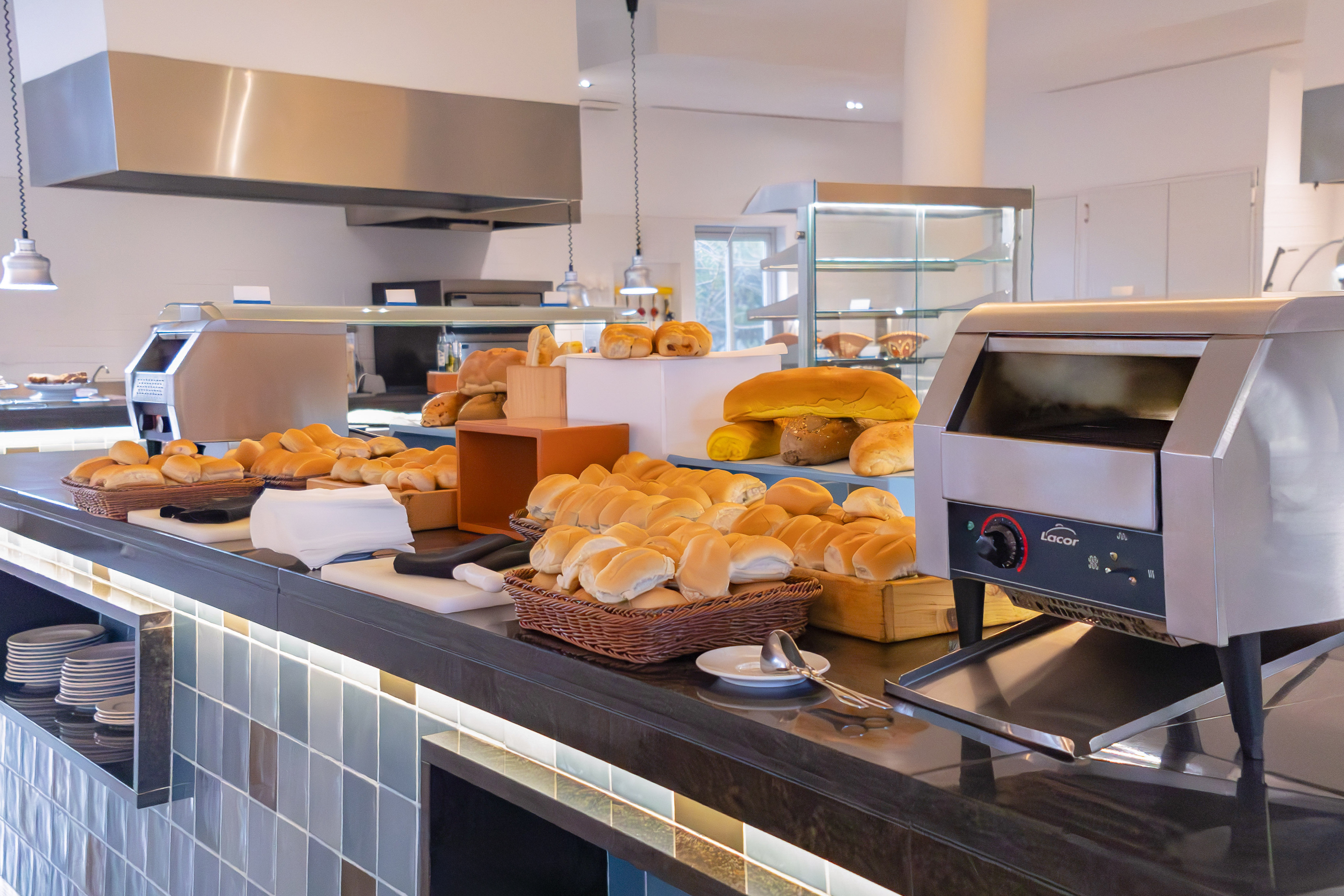 a counter with bread and other food items