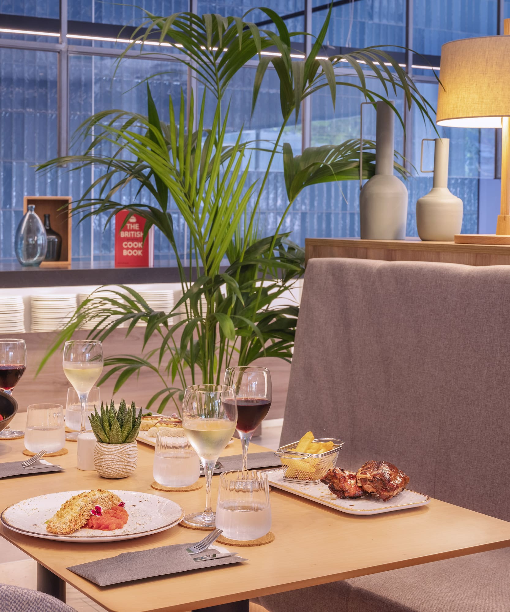 a table with food and wine glasses on it