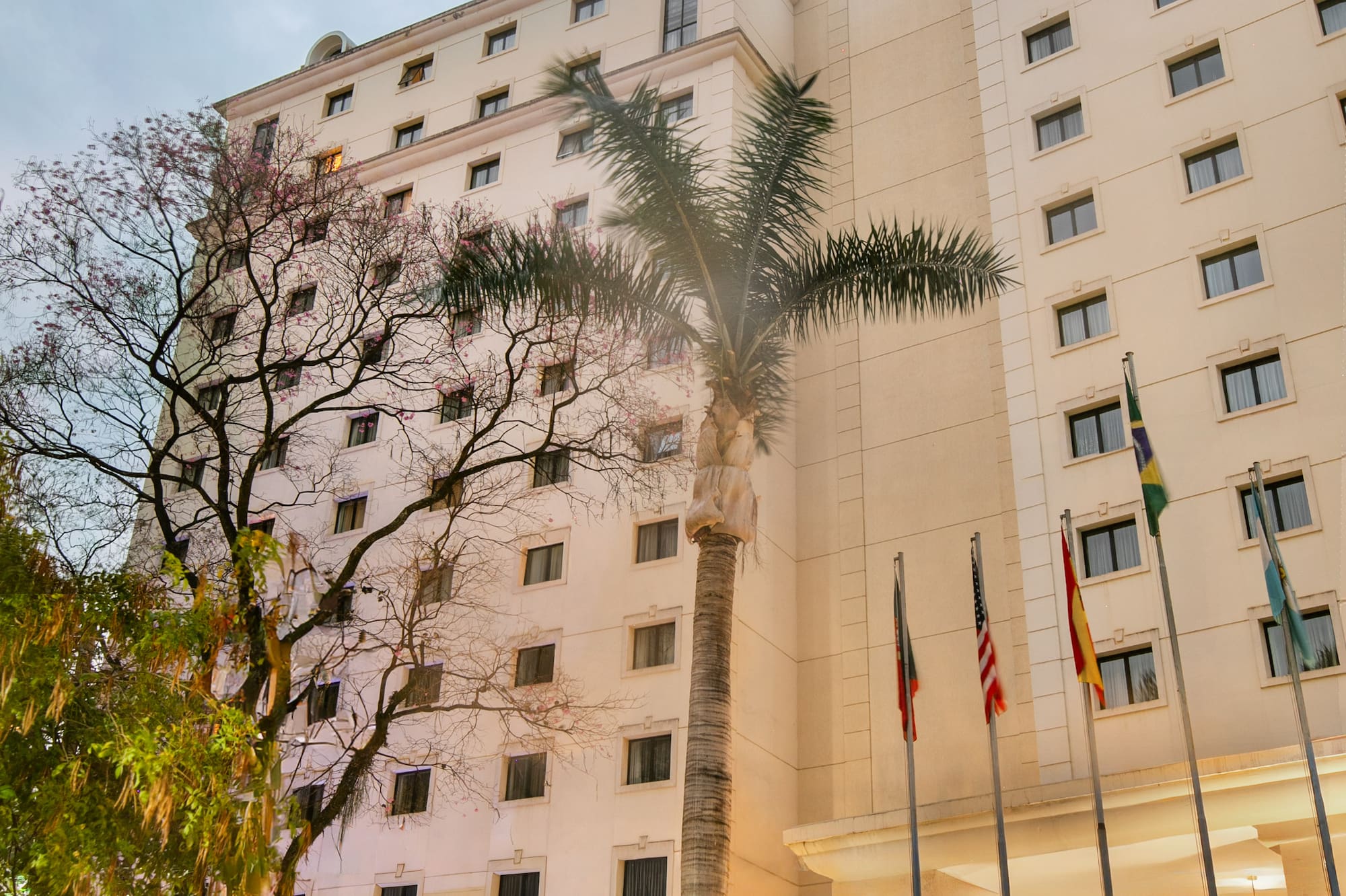 a building with flags in front of it