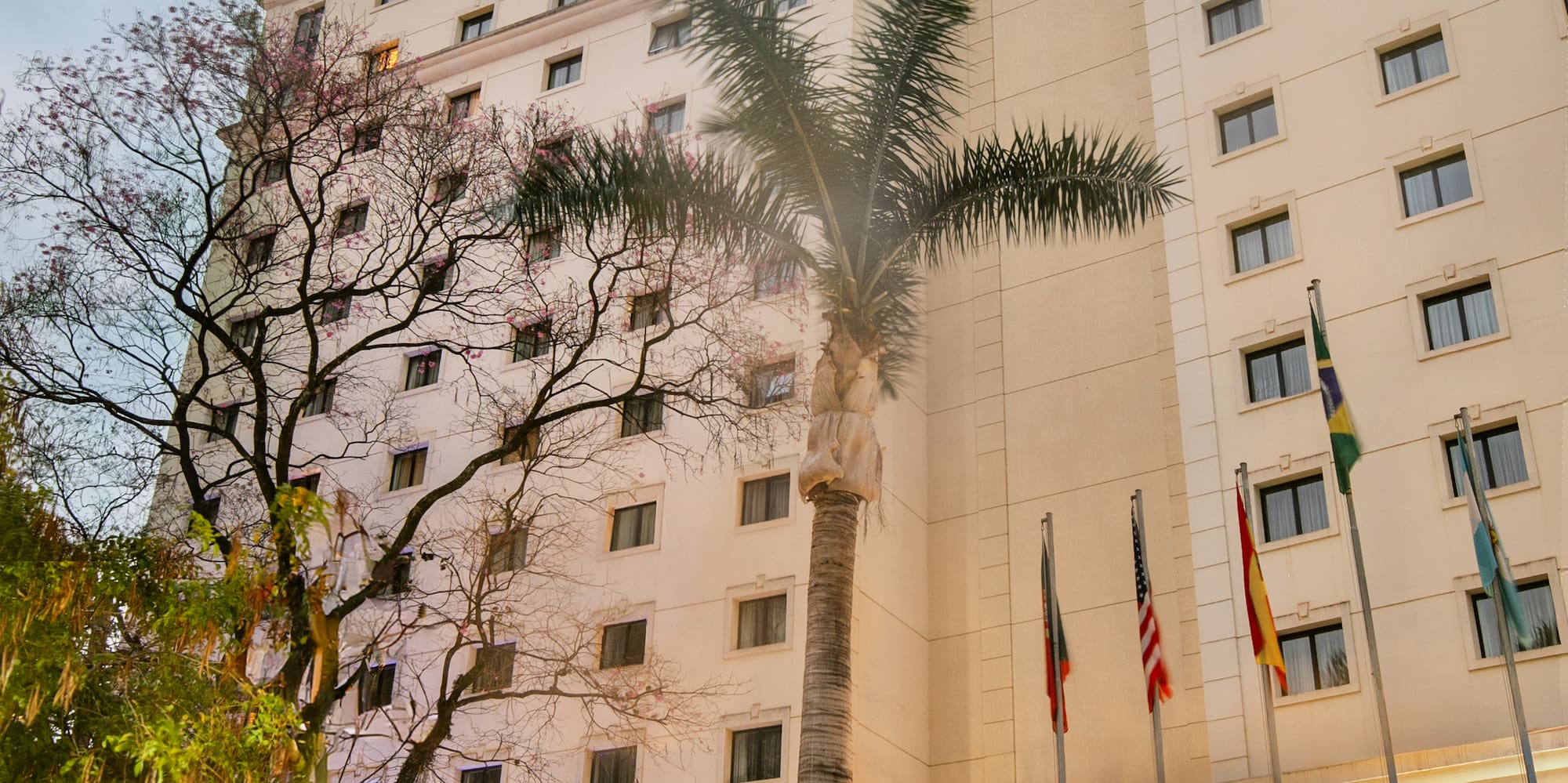 a building with flags in front of it