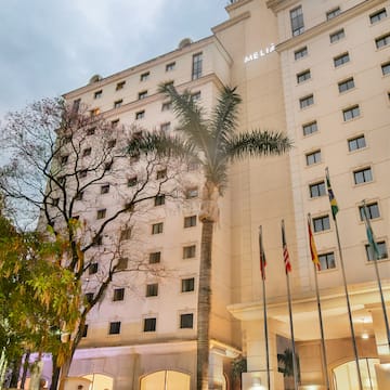 a building with flags in front of it
