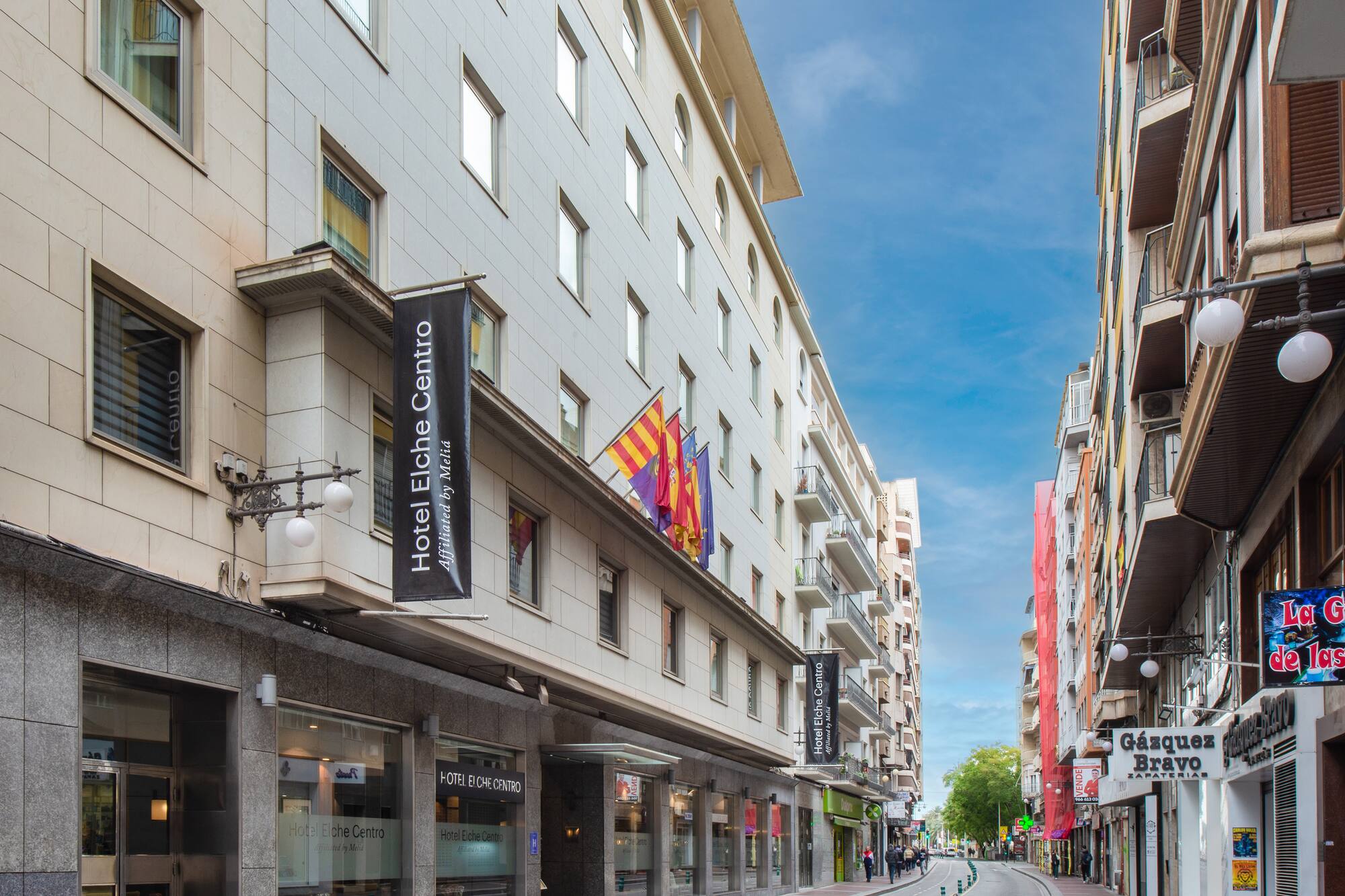 Hotel Elche Centro Meliá building on a city street, Elche, Spain.