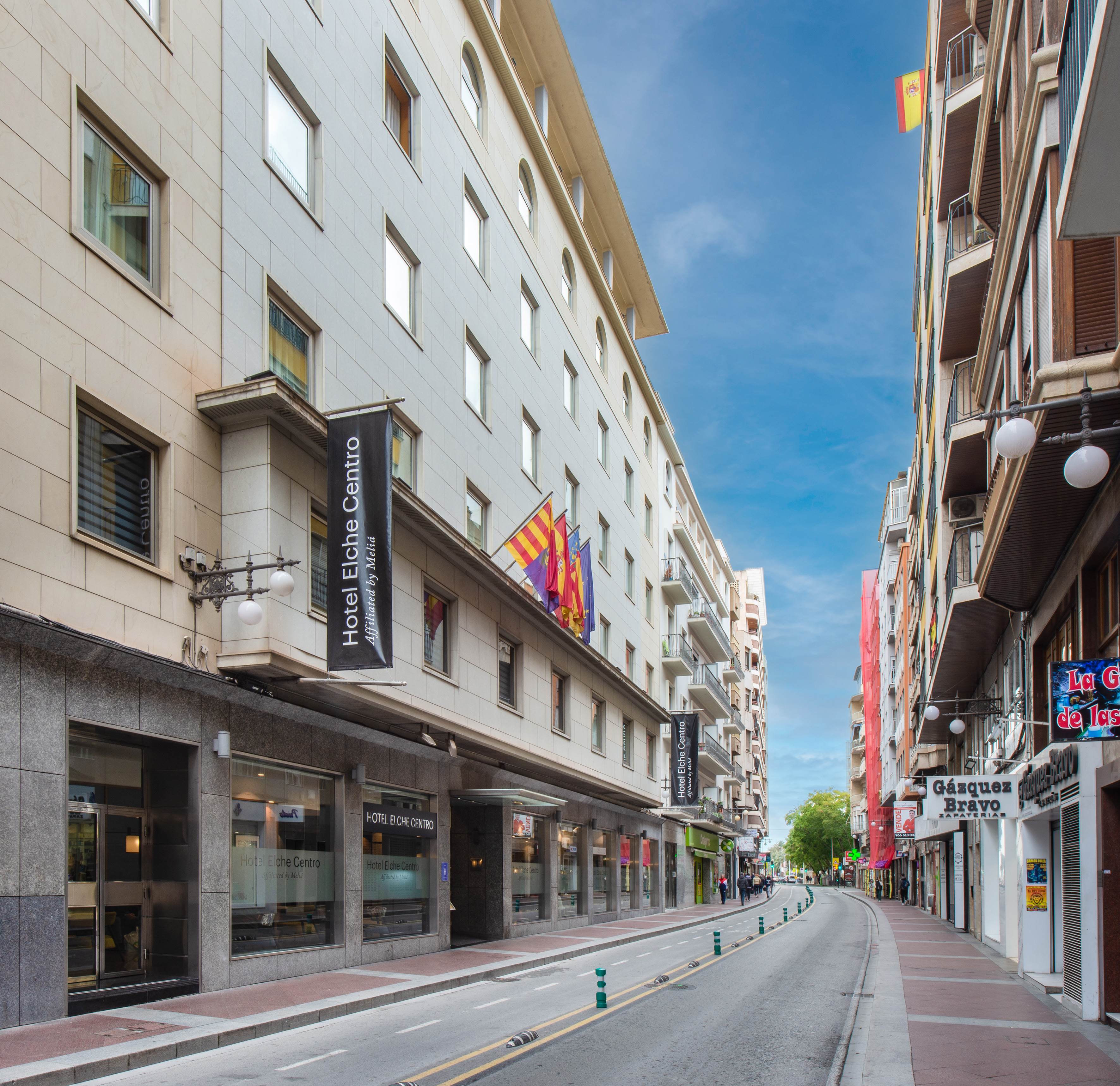 a street with buildings and signs on it