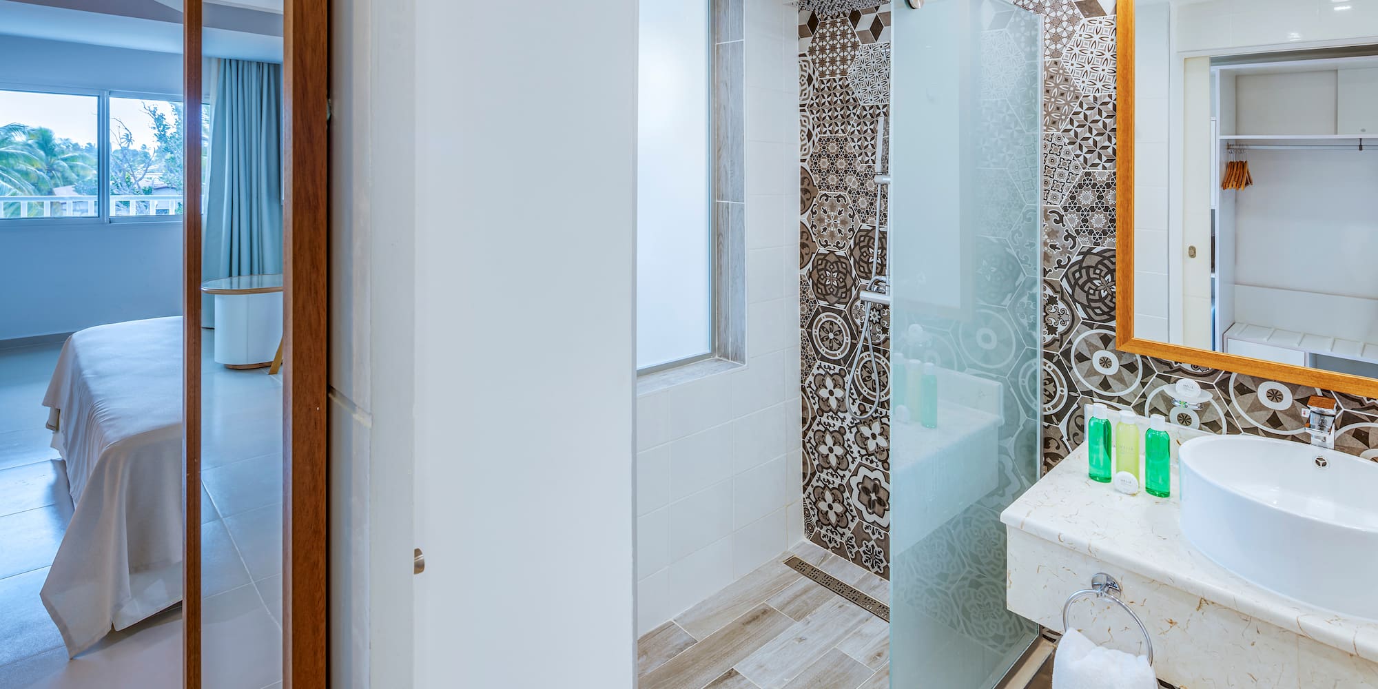 a bathroom with a shower and sink