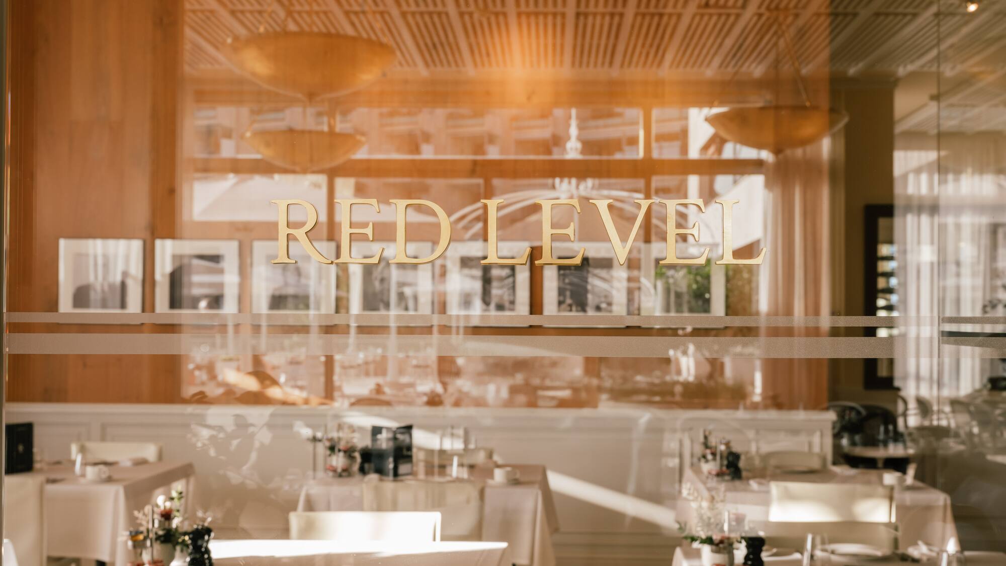 a restaurant with tables and chairs