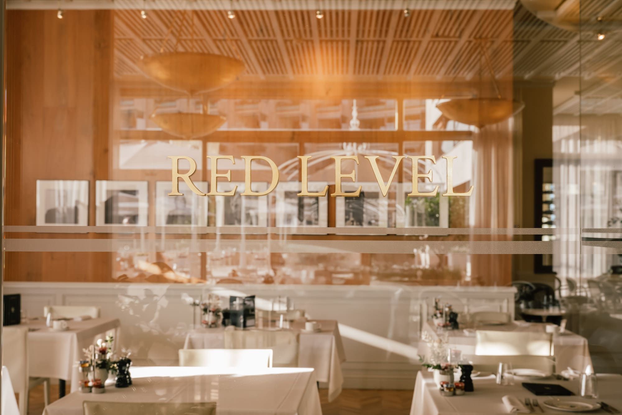 a restaurant with tables and chairs