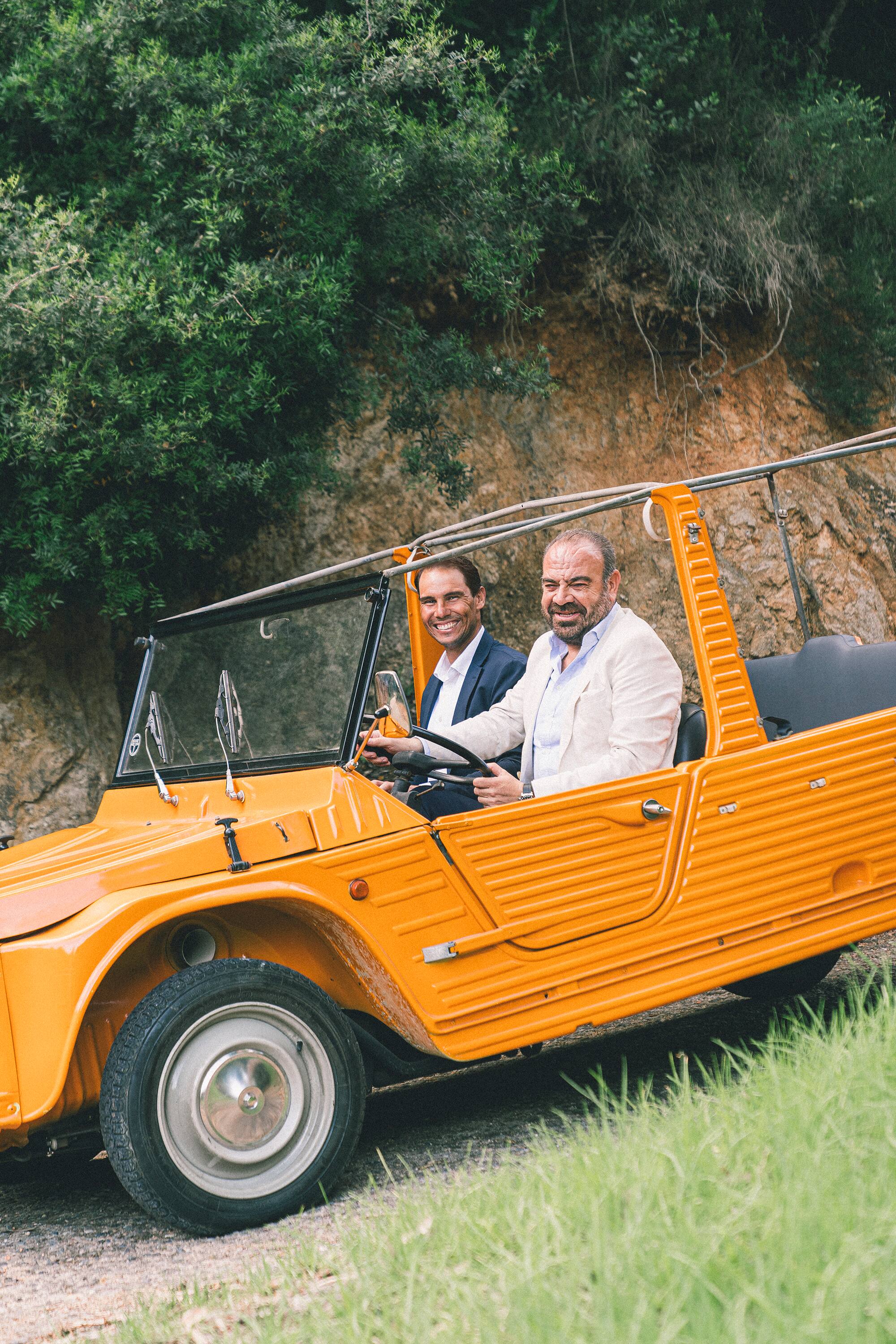 two men in a car