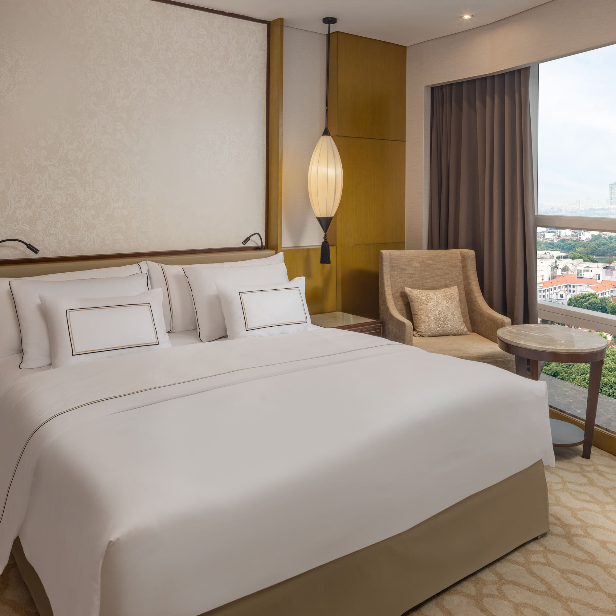 a hotel room with a bed and a window