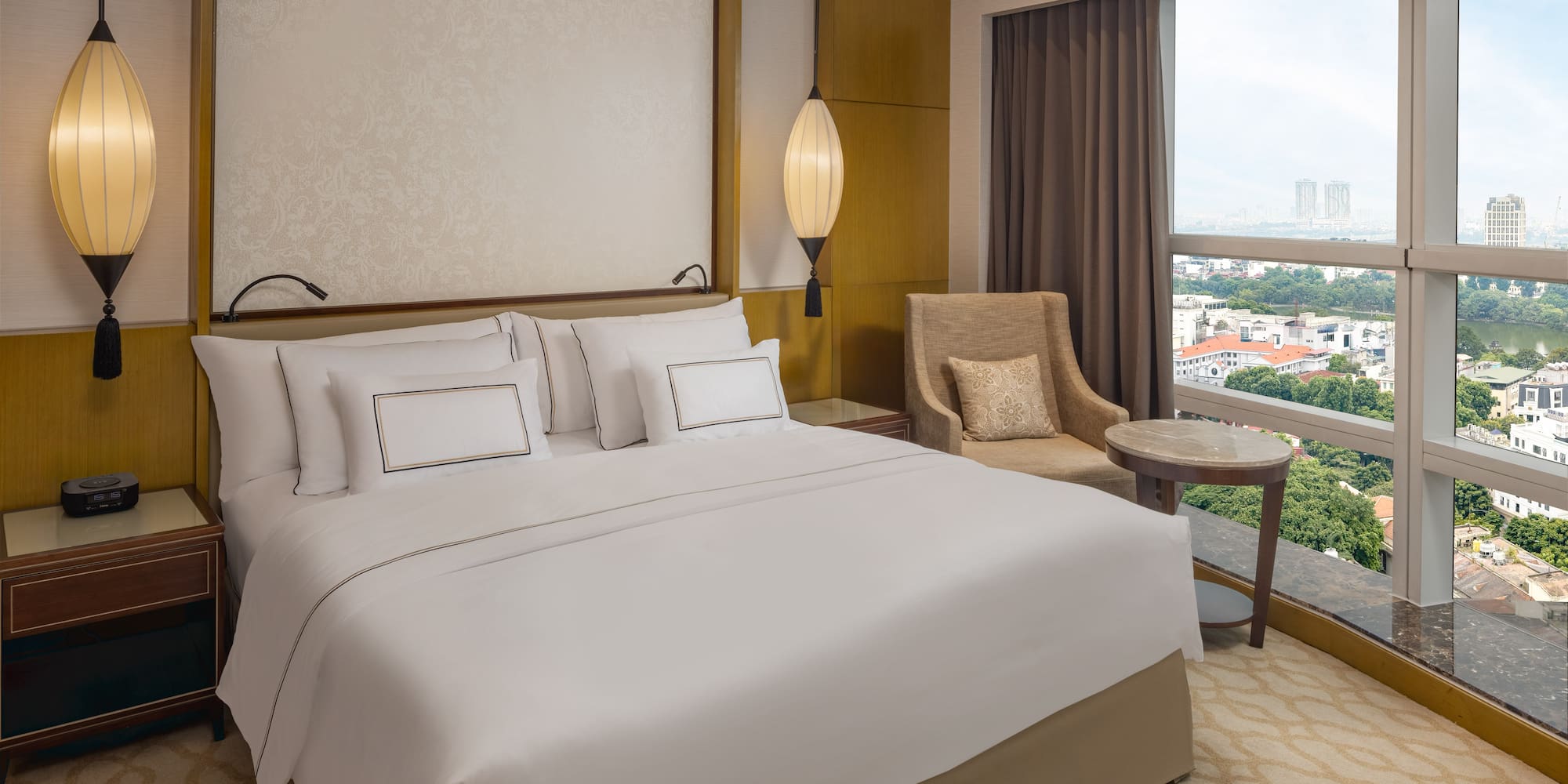 a hotel room with a bed and a window