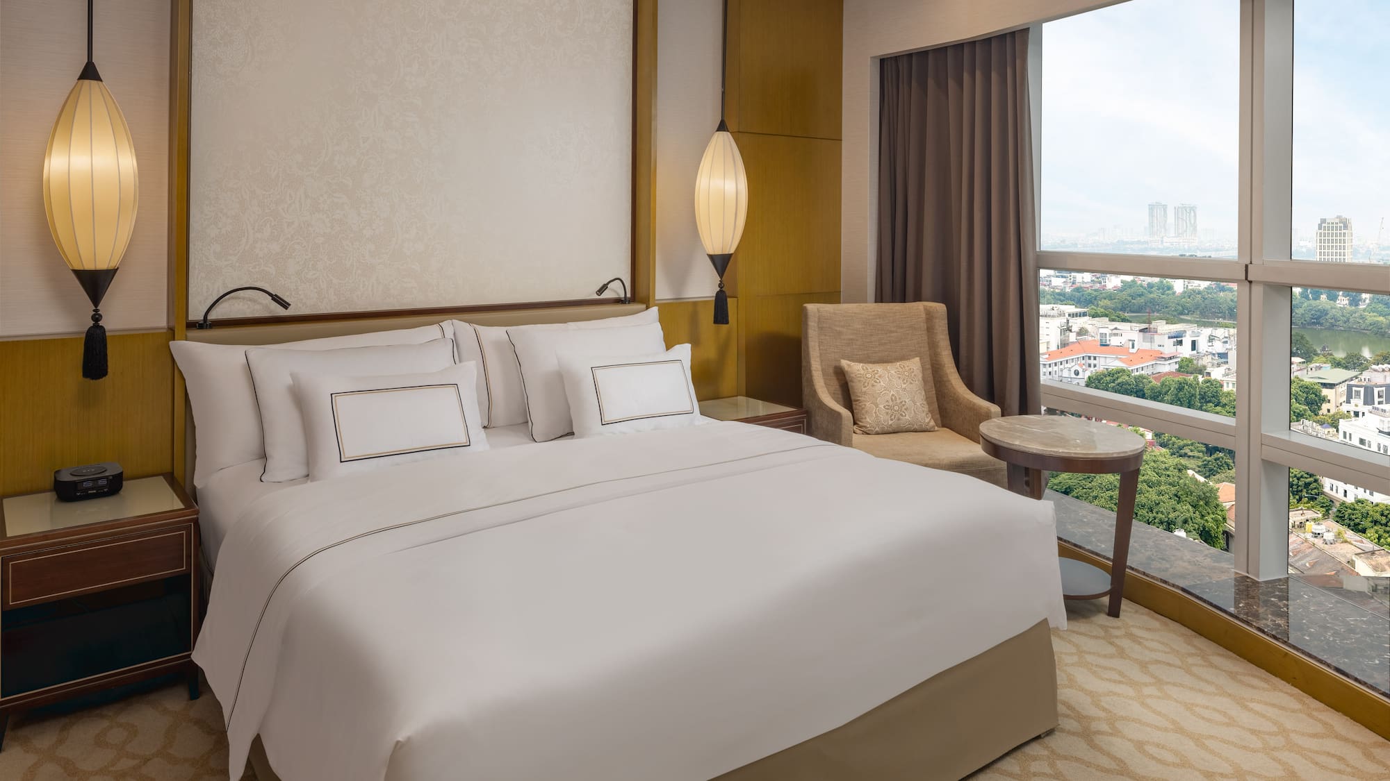 a hotel room with a bed and a window