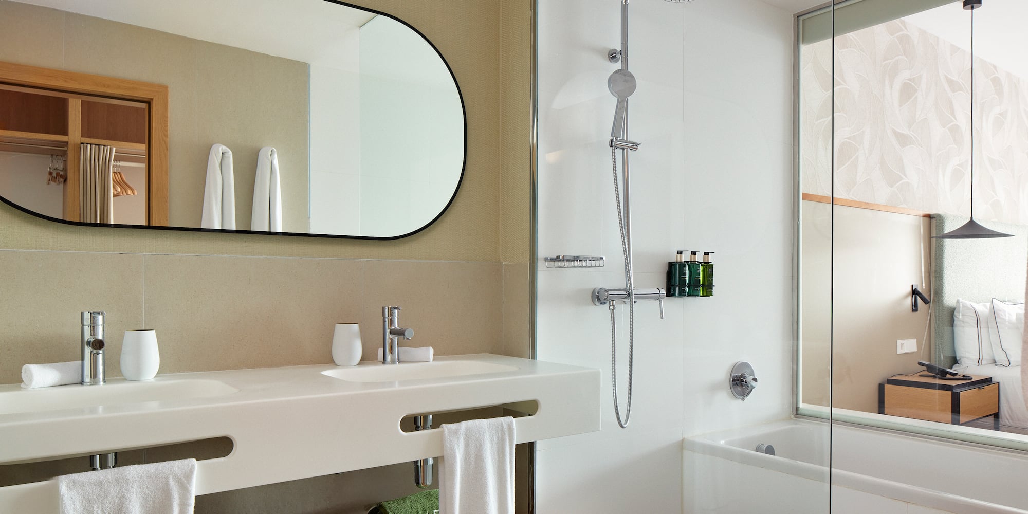 a bathroom with a shower and a sink