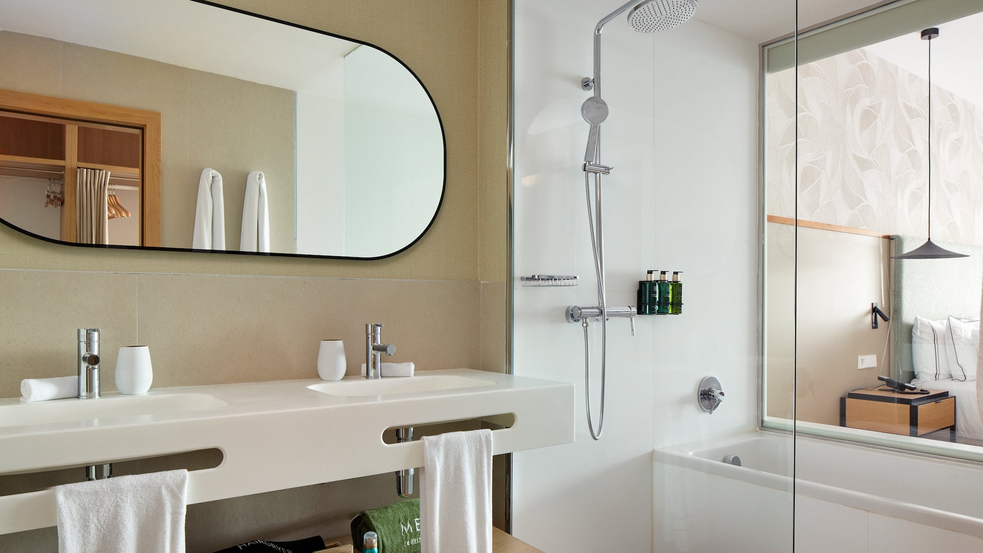 a bathroom with a shower and a sink