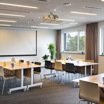 a room with tables and chairs