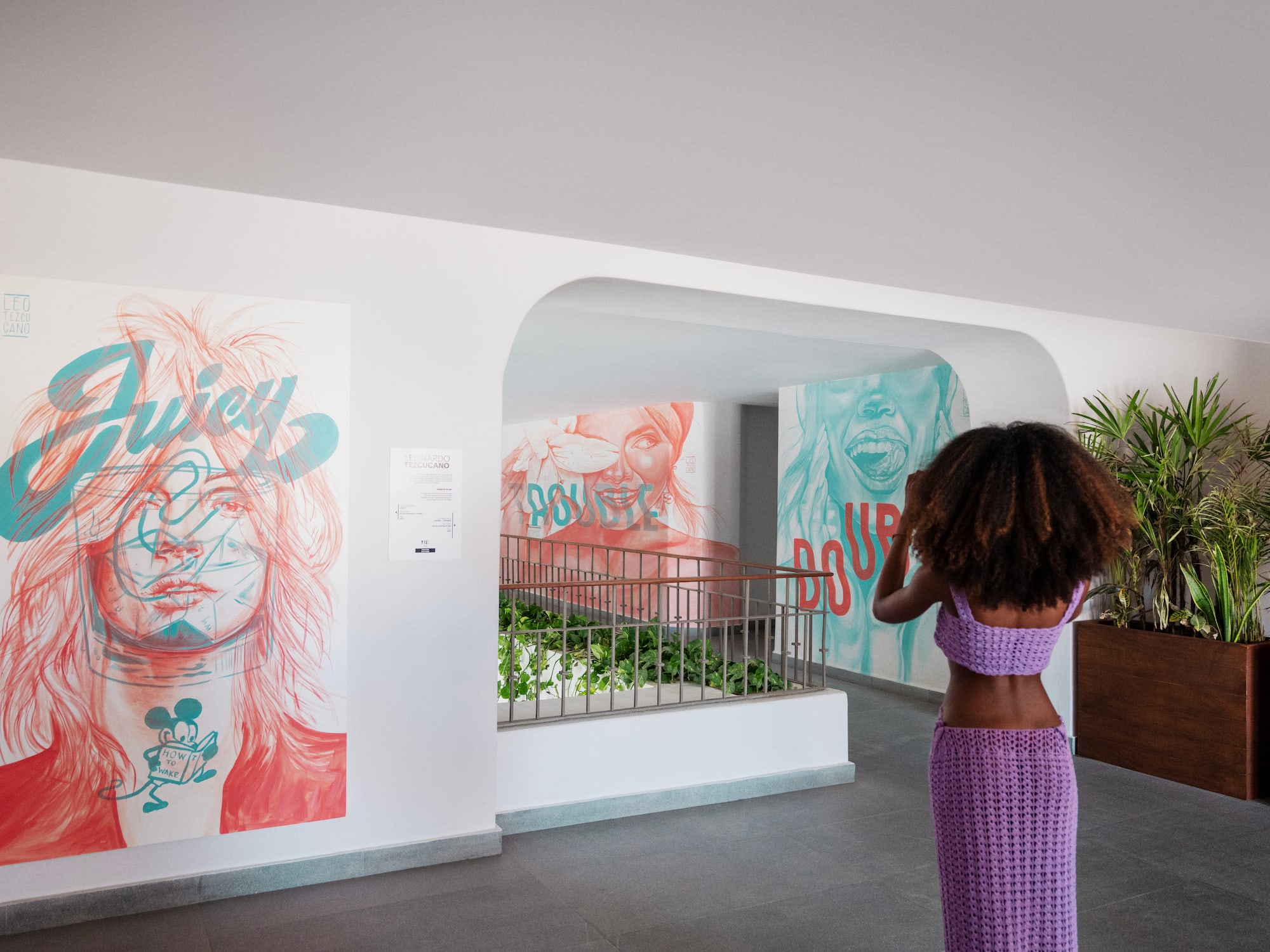 a woman taking a picture of a woman