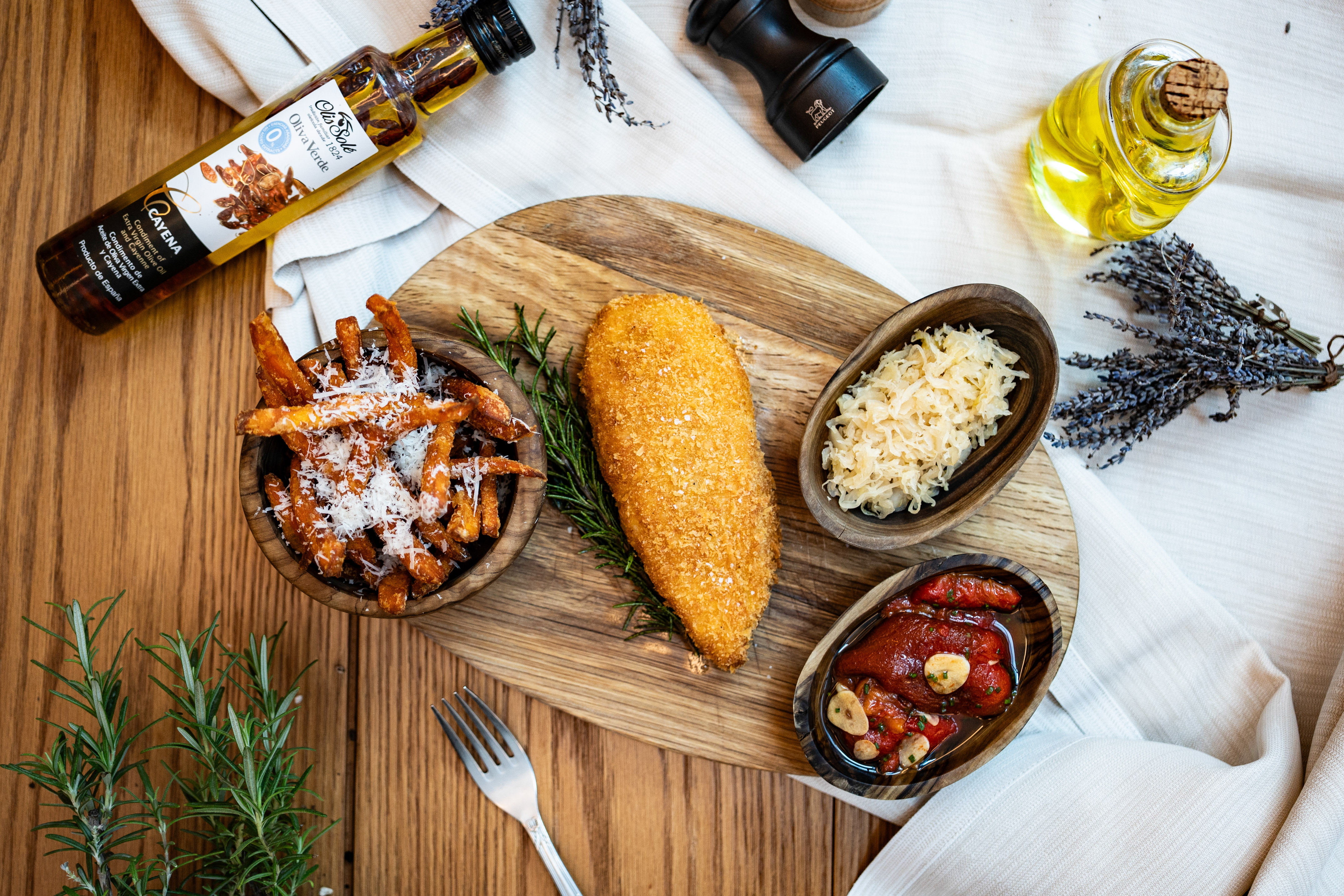 Fried main, sweet potato fries, sauerkraut, roasted peppers, olive oil.