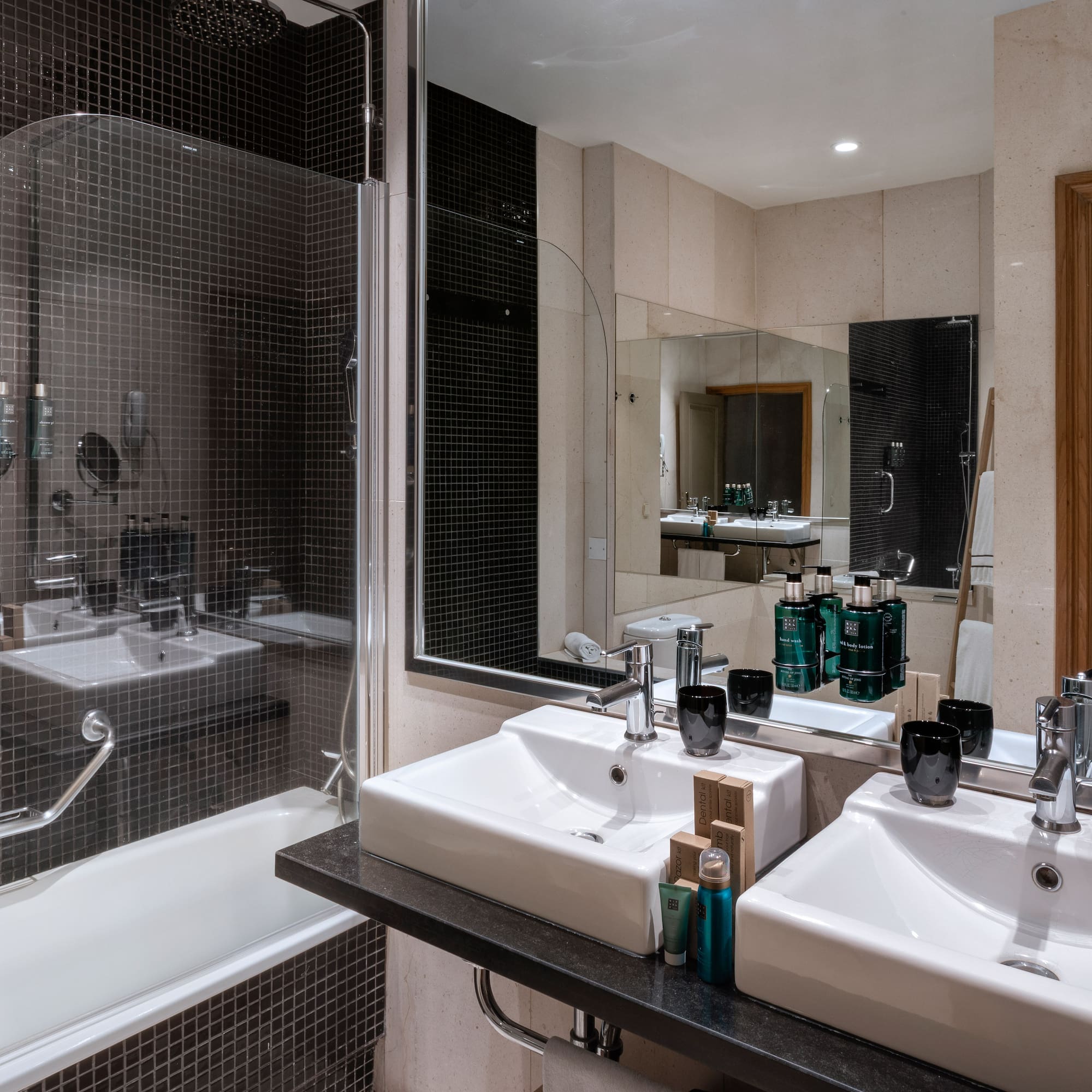 a bathroom with a shower and sink