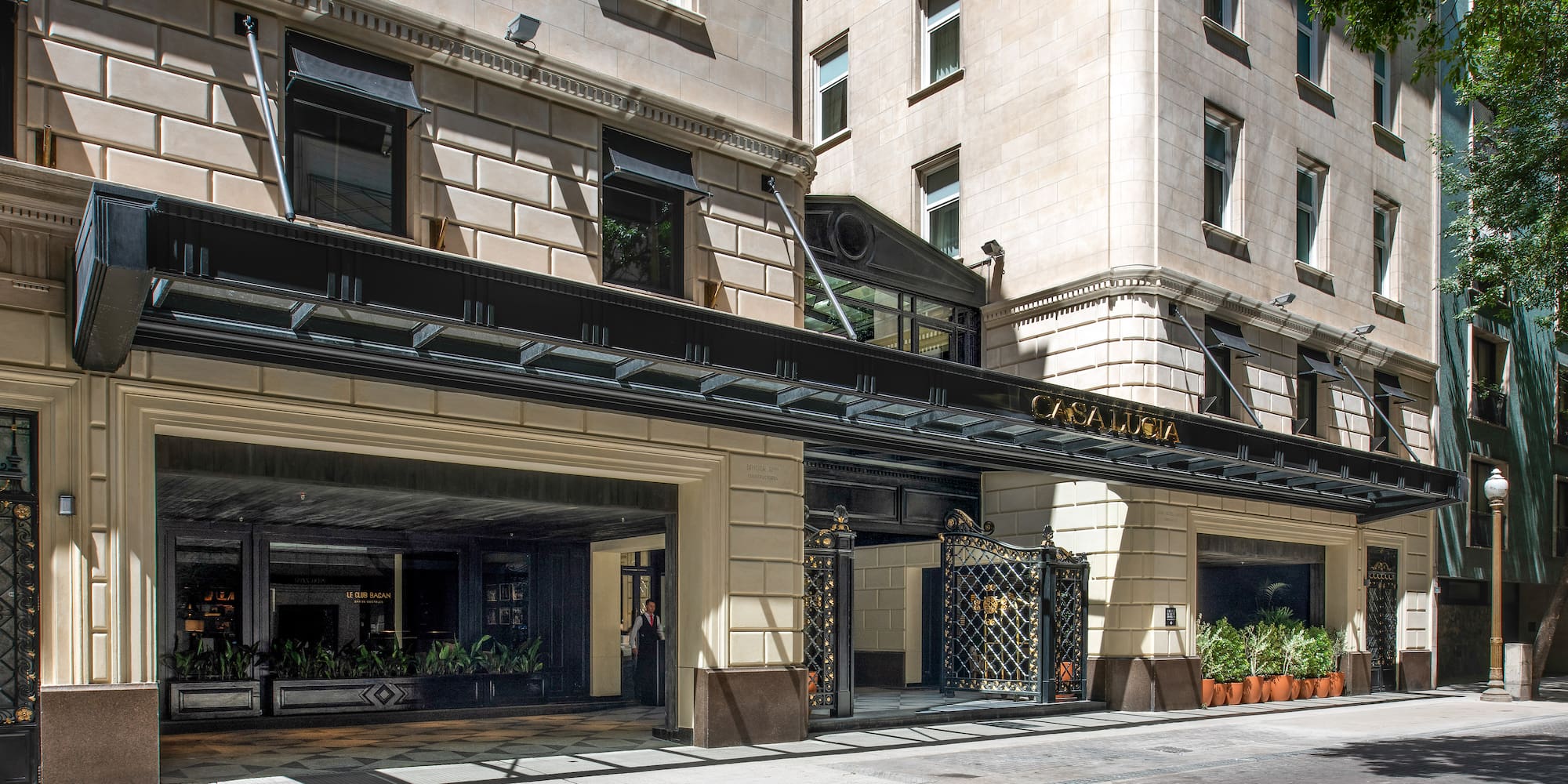 a building with windows and a grey background