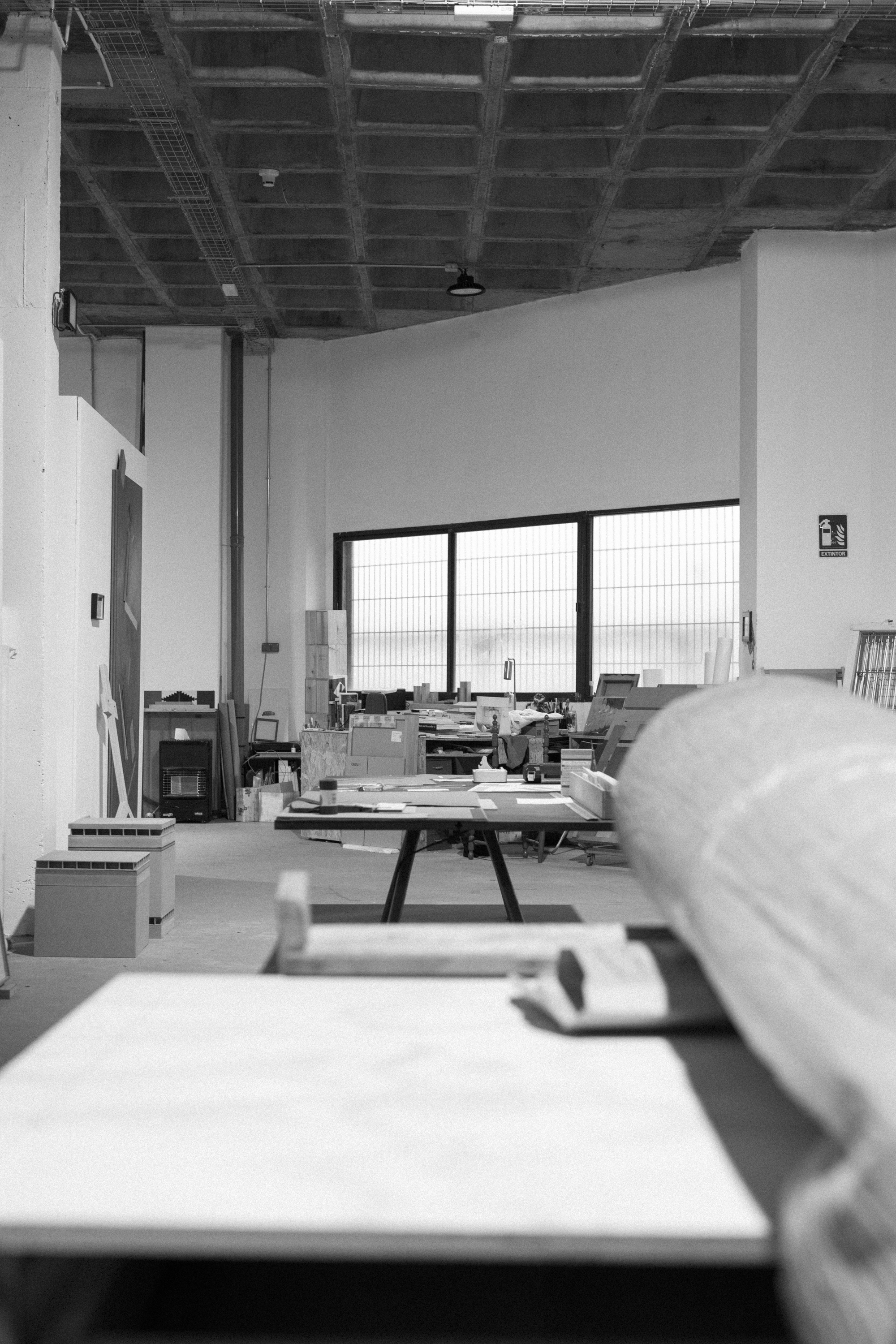 a room with a large table and a large window