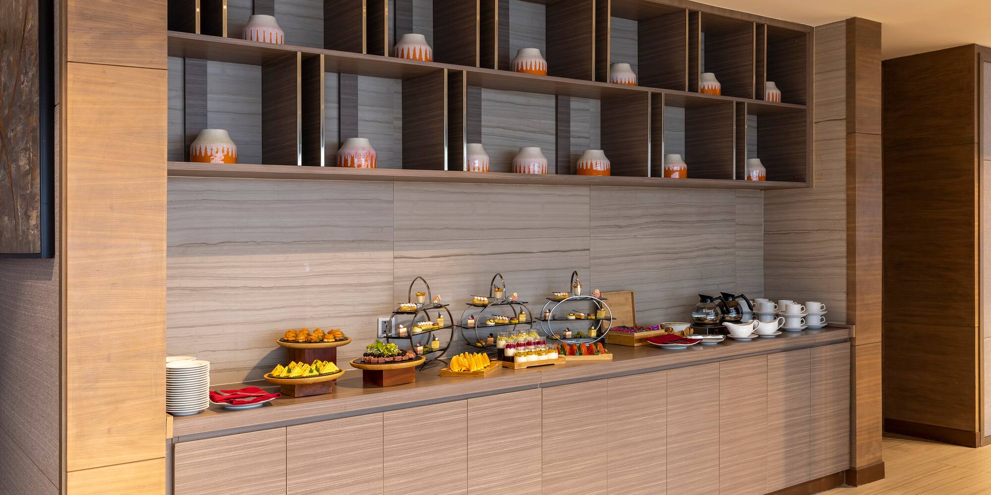 a buffet with food on the counter