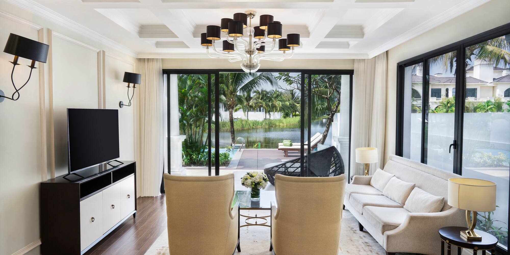 a living room with a television and a couch