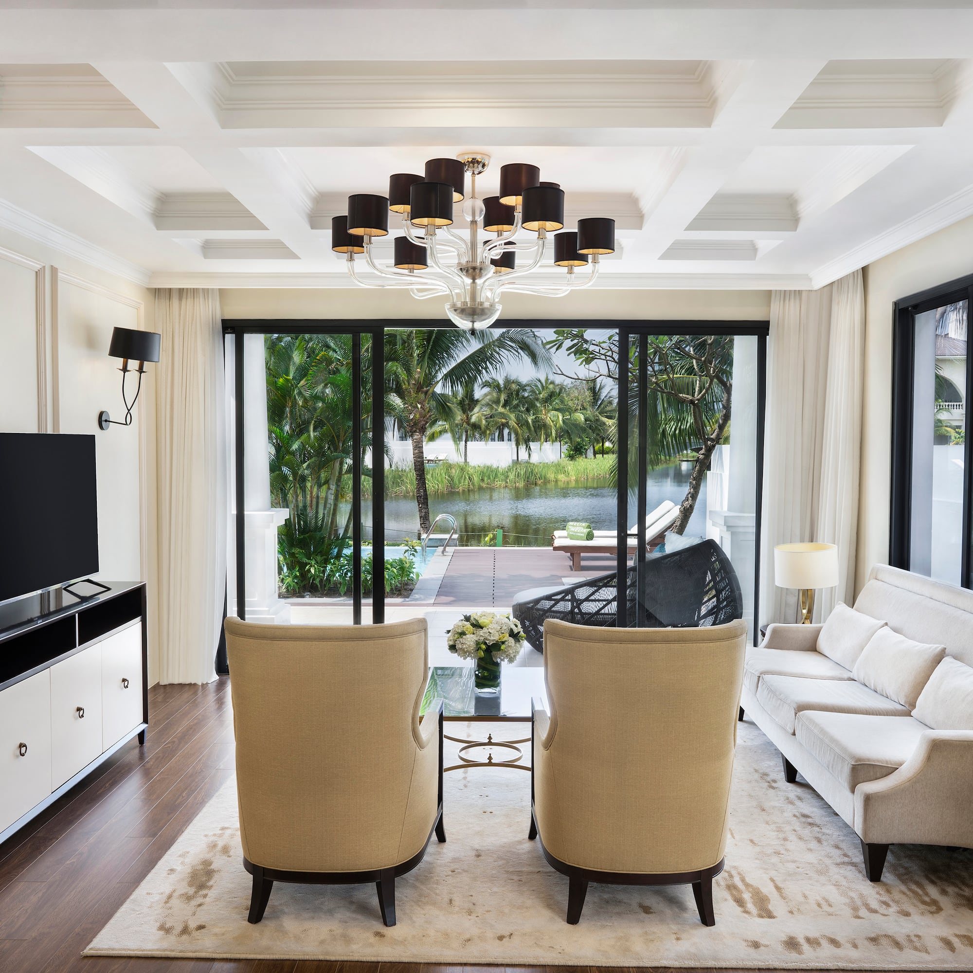 a living room with a television and a couch
