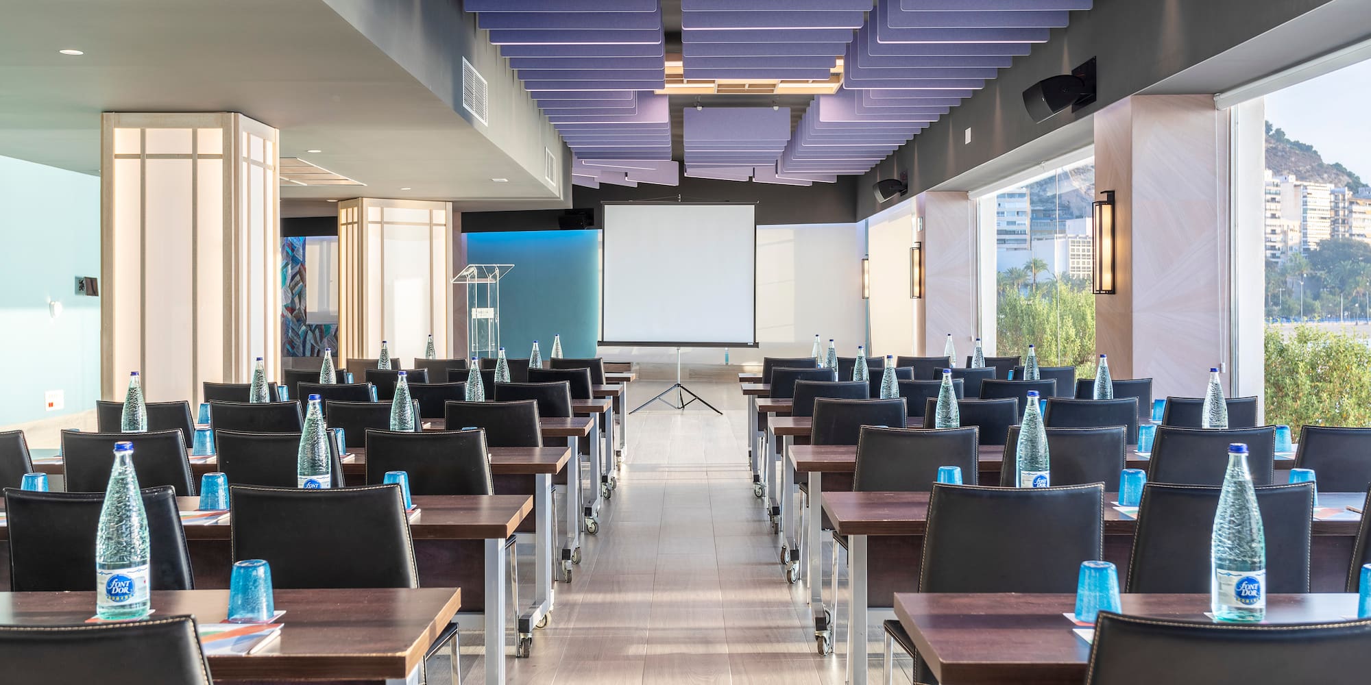 a room with tables and chairs