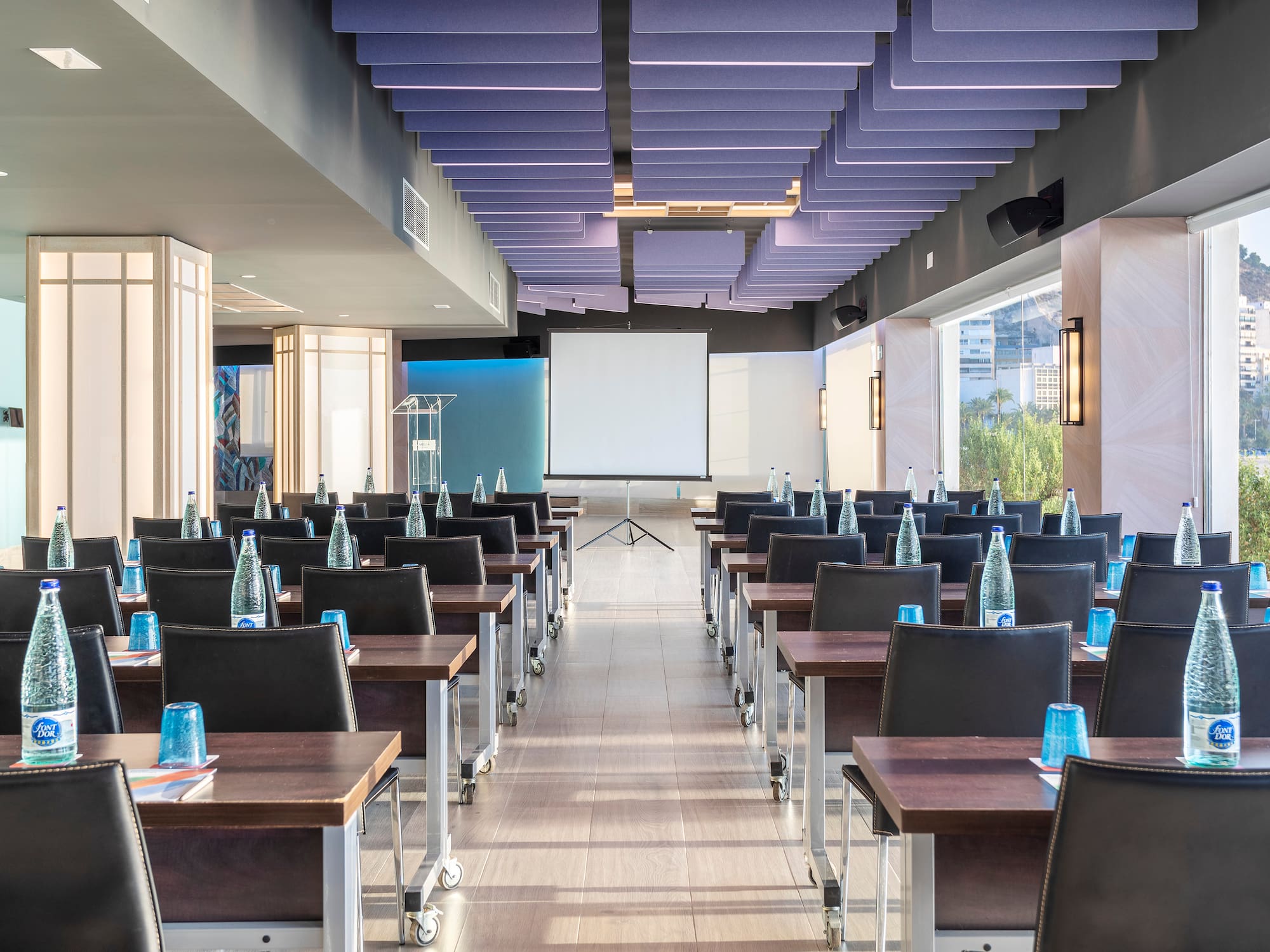 a room with tables and chairs