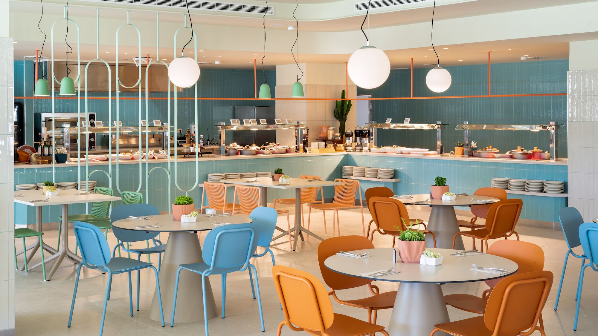 a restaurant with tables and chairs