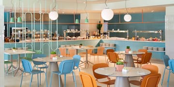 a restaurant with tables and chairs